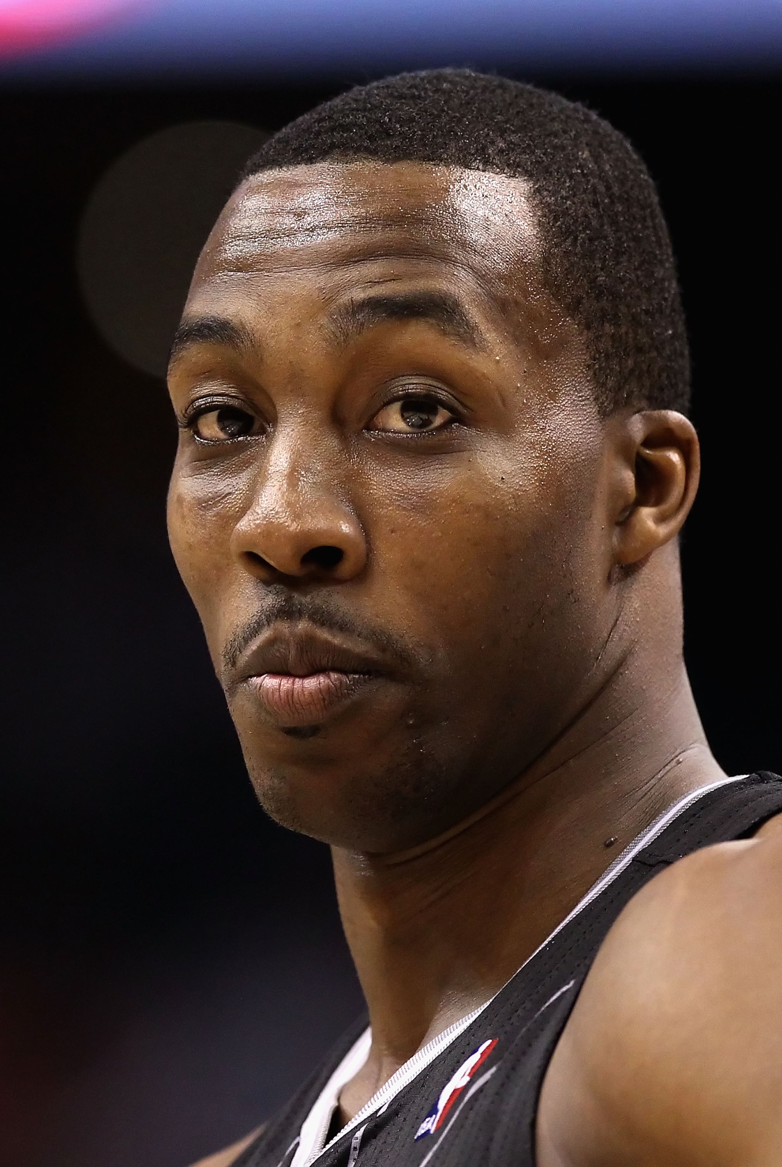 PHOENIX, AZ - MARCH 13:  Dwight Howard #12 of the Orlando Magic during the NBA game against the Phoenix Suns at US Airways Center on March 13, 2011 in Phoenix, Arizona. The Magic defeated the Suns 111-88. NOTE TO USER: User expressly acknowledges and agre