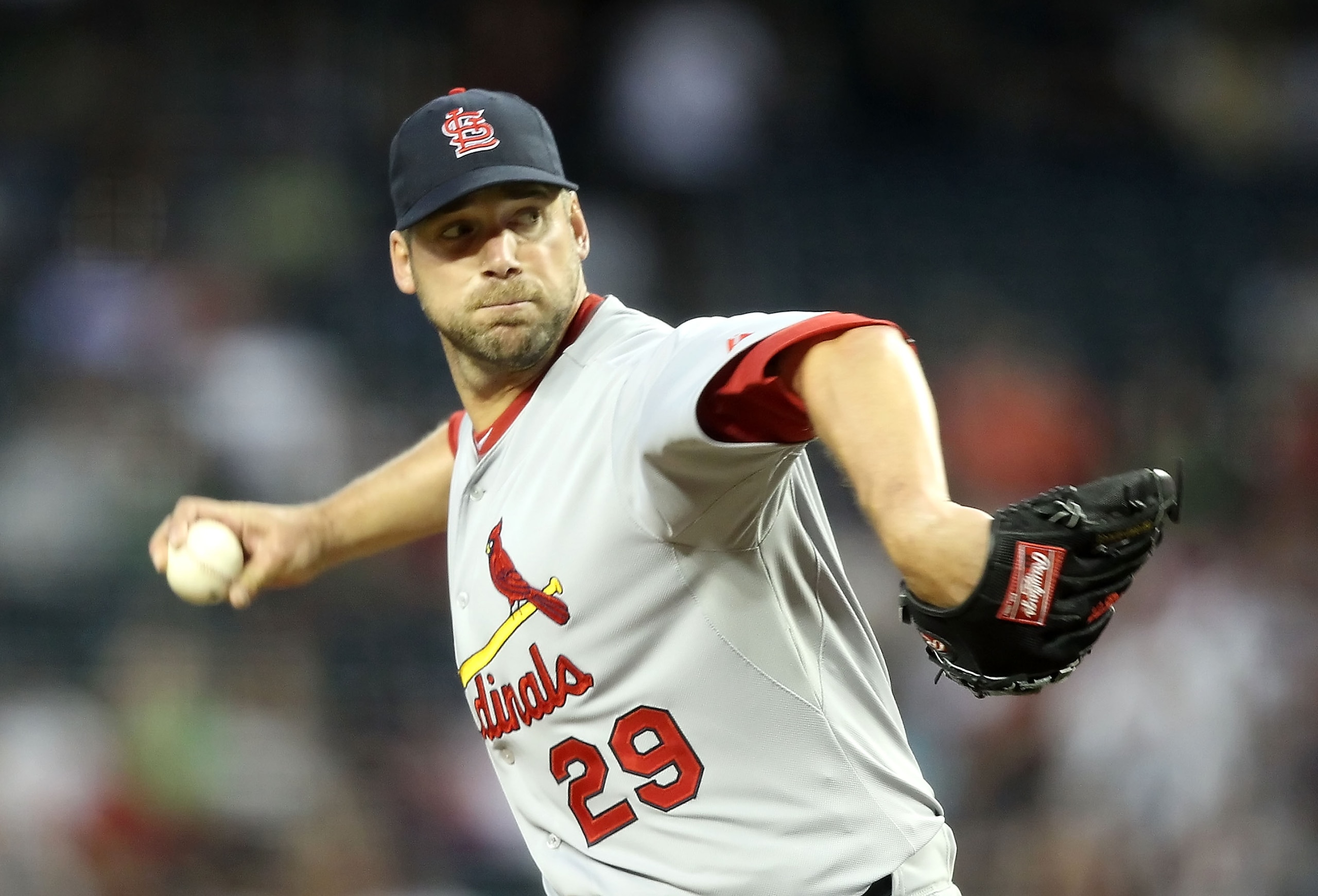 PHOENIX, AZ - APRIL 12:  Starting pitcher Chris Carpenter #29 of the St. Louis Cardinals pitches against the Arizona Diamondbacks during the Major League Baseball game at Chase Field on April 12, 2011 in Phoenix, Arizona.  (Photo by Christian Petersen/Get