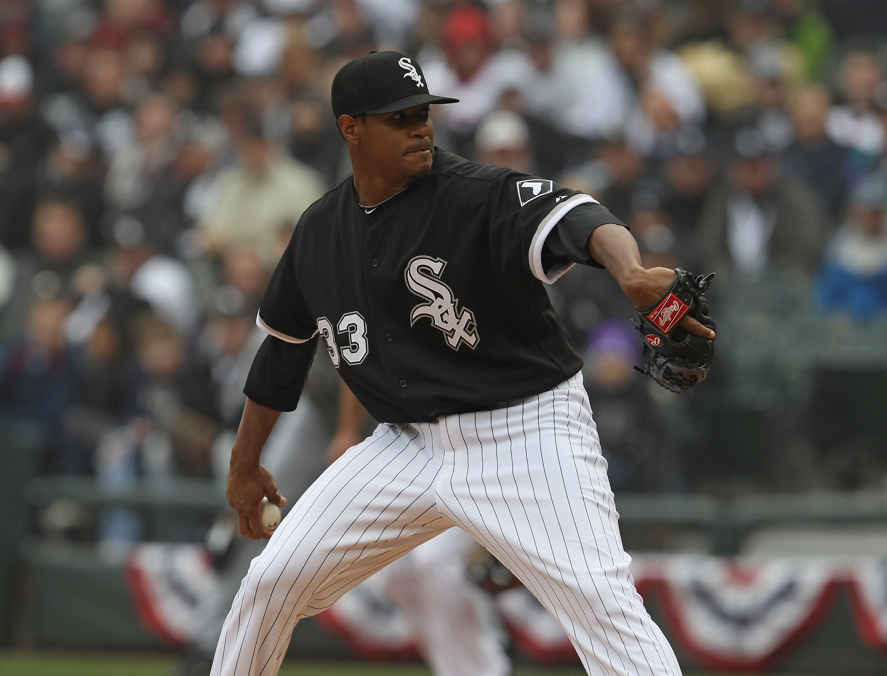 CHICAGO, IL - APRIL 07: Starting pitcher Edwin Jackson #33 of the Chicago White Sox delivers the ball against the Tampa Bay Rays during the home opener at U.S. Cellular Field on April 7, 2011 in Chicago, Illinois. The White Sox defeated the Rays 5-1. (Pho