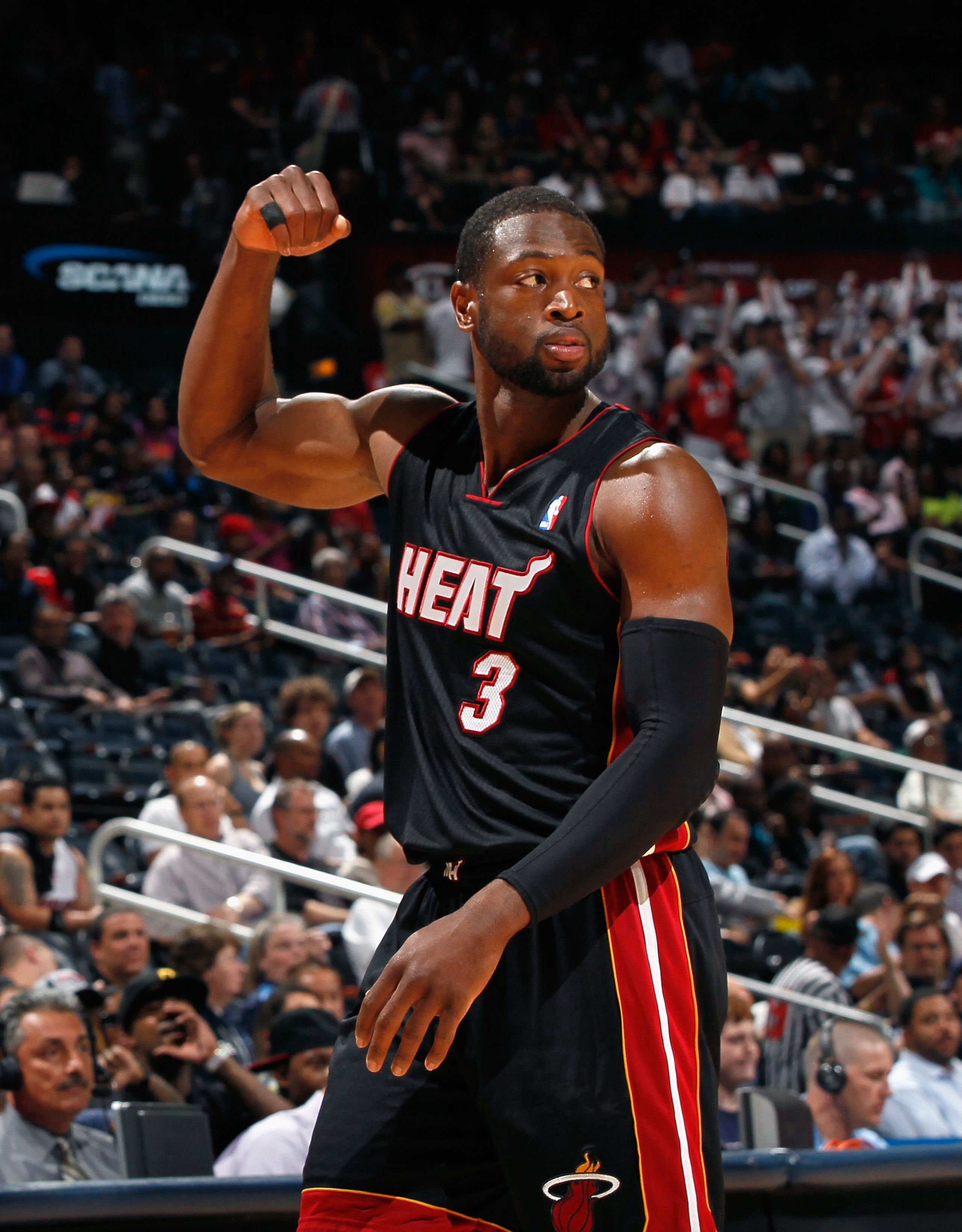 ATLANTA, GA - APRIL 11:  Dwyane Wade #3 of the Miami Heat reacts after a turnover by the Atlanta Hawks at Philips Arena on April 11, 2011 in Atlanta, Georgia.  NOTE TO USER: User expressly acknowledges and agrees that, by downloading and/or using this Pho