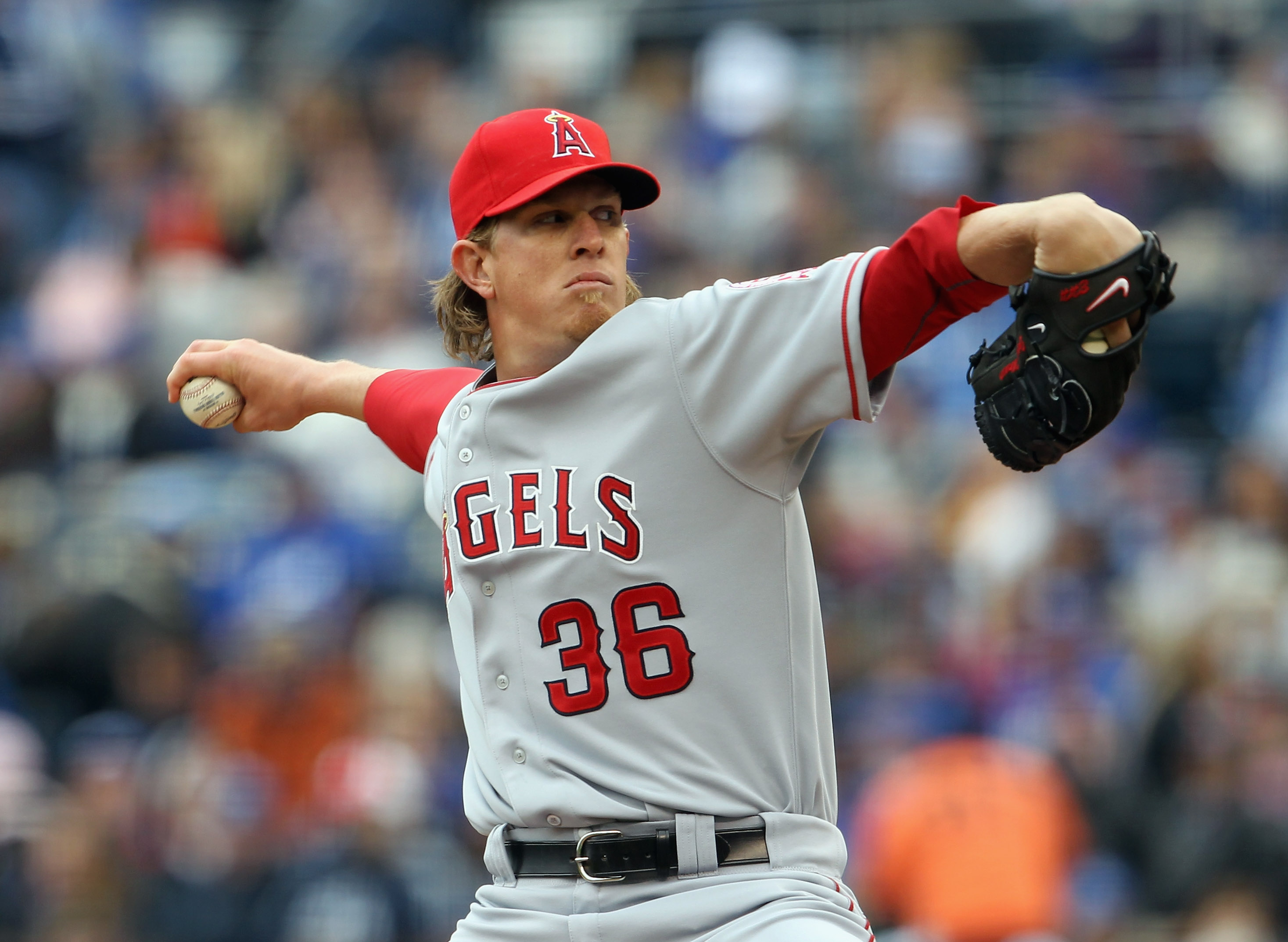 KANSAS CITY, MO - MARCH 31:  Starting pitcher Jered Weaver #36 of the Los Angeles Angels of Anaheim delivers his first pitch during the 1st inning of the opening day game against the Kansas City Royals at Kauffman Stadium on March 31, 2011 in Kansas City,