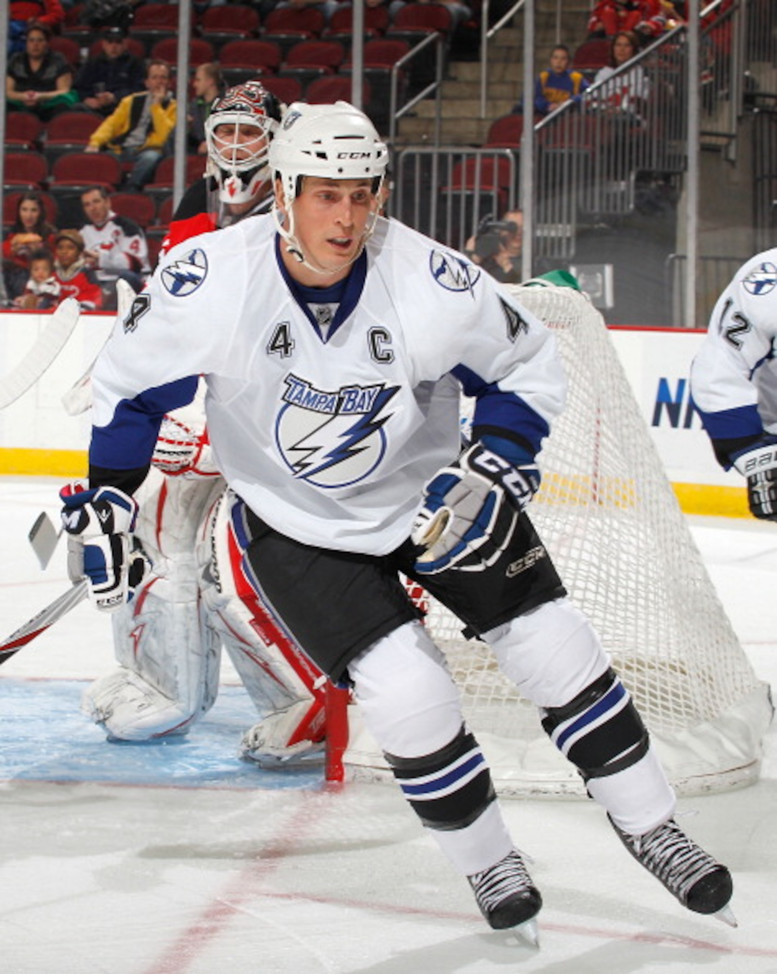 NEWARK, NJ - MARCH 02:  Vincent Lecavalier #4 of the Tampa Bay Lightning skates during an NHL hockey game against the New Jersey Devils at the Prudential Center on March 2, 2011 in Newark, New Jersey.  (Photo by Paul Bereswill/Getty Images)