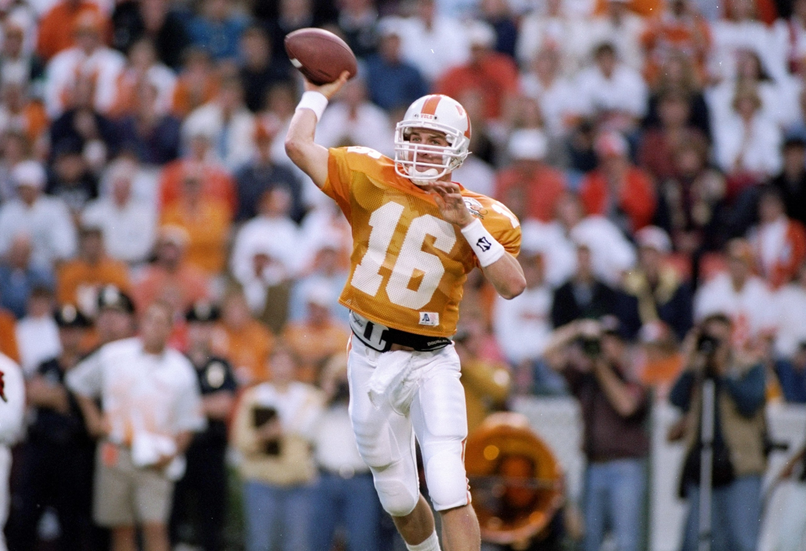 15 Oct 1994:  Quarterback Peyton Manning #16 of the Tennessee Volunteers in action during a game against the Alabama Crimson Tide.  The Alabama Crimson Tide won the game 17-13.  Mandatory Credit: Rick Stewart  /Allsport