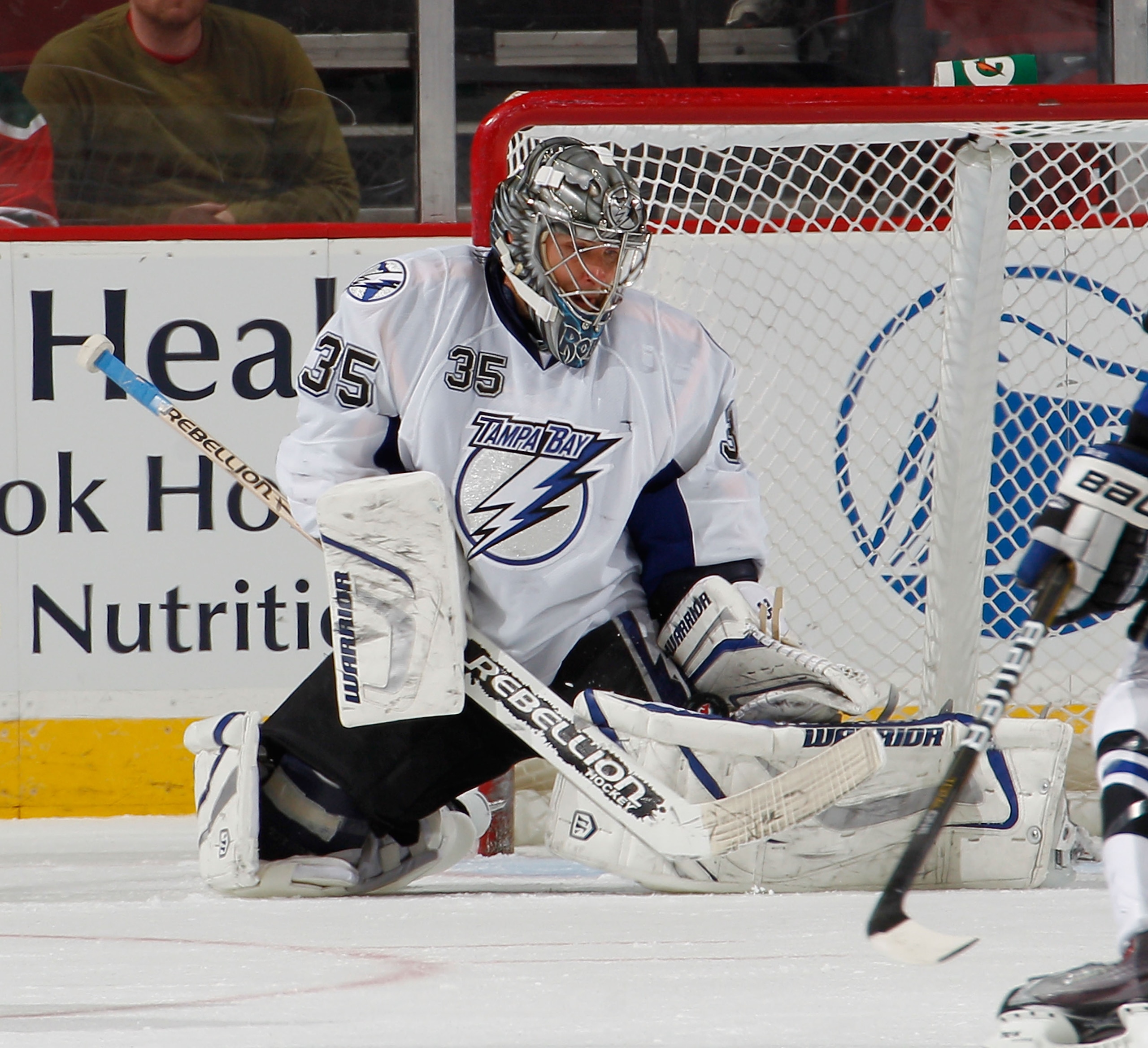 NEWARK, NJ - MARCH 02:  Goalie Dwayne Roloson #35 of the Tampa Bay Lightning makes a save during an NHL hockey game against the New Jersey Devils at the Prudential Center on March 2, 2011 in Newark, New Jersey.  (Photo by Paul Bereswill/Getty Images)