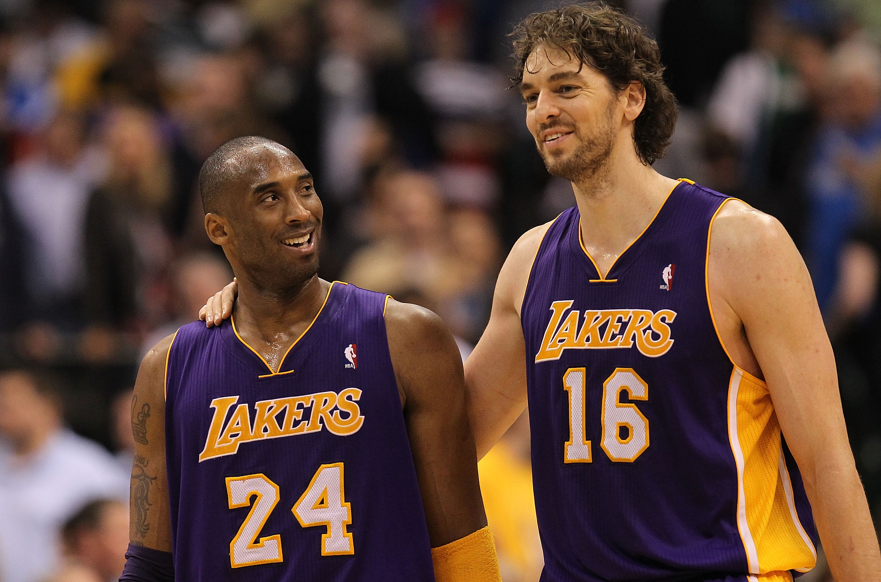 DALLAS, TX - MARCH 12:  Kobe Bryant #24 and Pau Gasol #16 of the Los Angeles Lakers react after a 96-91 win against the Dallas Mavericks at American Airlines Center on March 12, 2011 in Dallas, Texas.  NOTE TO USER: User expressly acknowledges and agrees