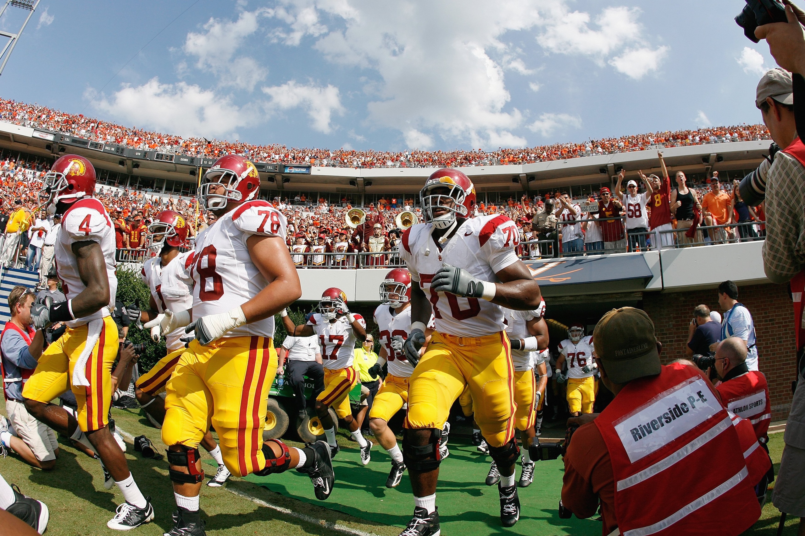CHARLOTTESVILLE, VA - AUGUST 30:  Khaled Holmes #87 and Tyron Smith #70 of the Southern California Trojans enter the field before the game against the Virginia Cavaliers at Scott Stadium on August 30, 2008 in Charlottesville, Virginia.  (Photo by Kevin C.
