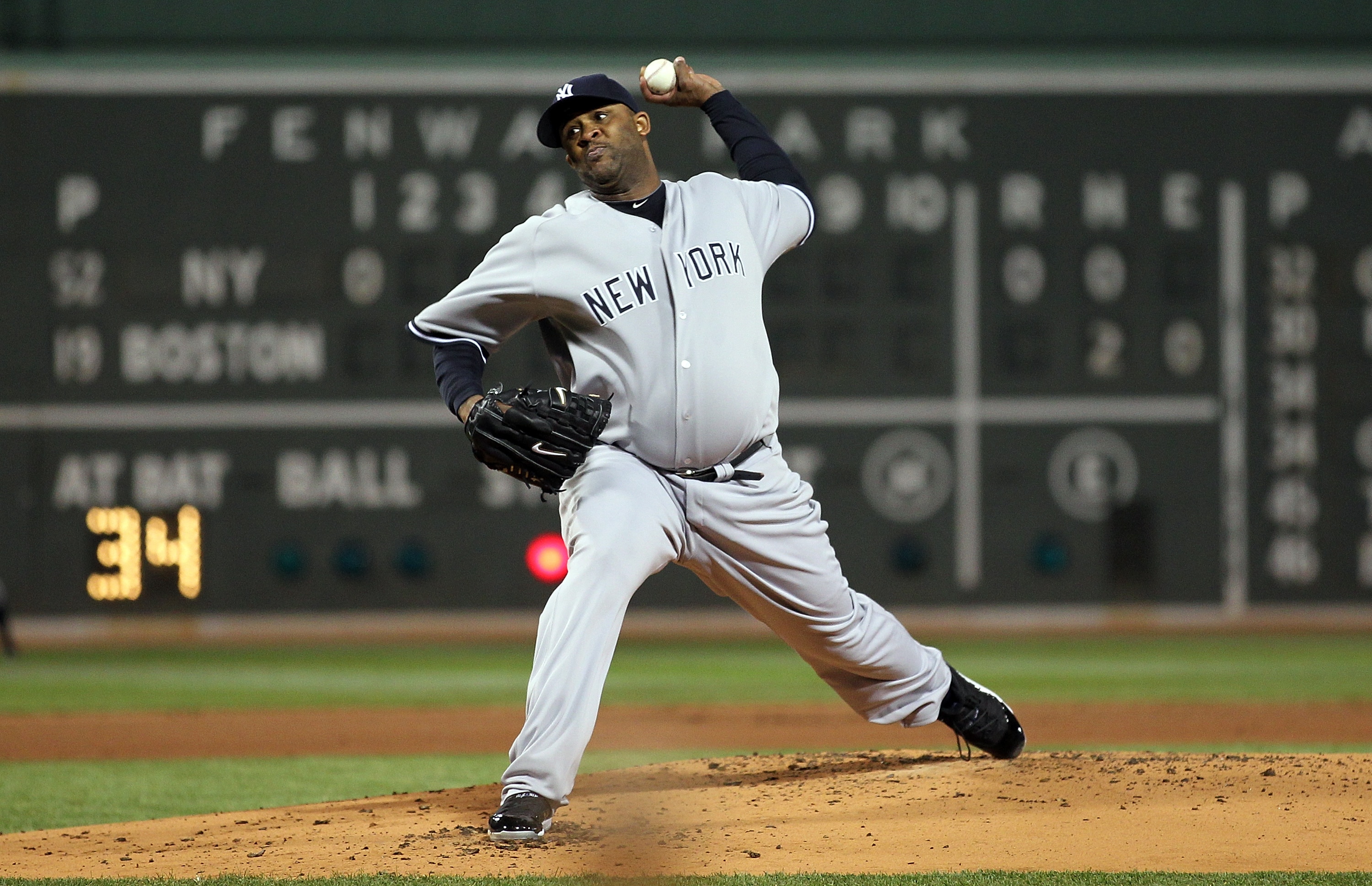 BOSTON, MA - APRIL 10: CC Sabathia #52 of the New York Yankees throws against the Boston Red Sox at Fenway Park April 10, 2011 in Boston, Massachusetts. (Photo by Jim Rogash/Getty Images) BOSTON, MA - APRIL 10: CC Sabathia #52 of the New York Yankees throws against the Boston Red Sox at Fenway Park April 10, 2011 in Boston, Massachusetts. (Photo by Jim Rogash/Getty Images)