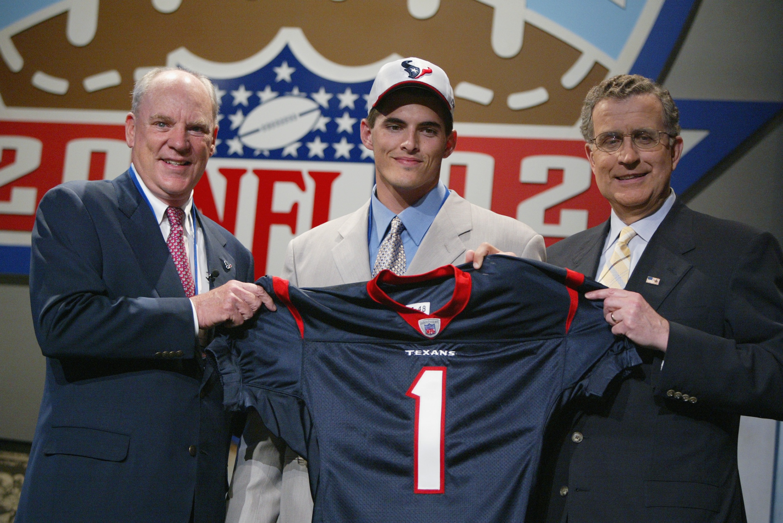 NEW YORK - APRIL 20:  David Carr of Fresno State poses with Houston Texans Owner Robert McNair (l) and  NFL Commisioner Paul Tagliabue  after Carr was selected as the first pick in the NFL Draft by the Texans at the Theatre in Madison Square Garden in New