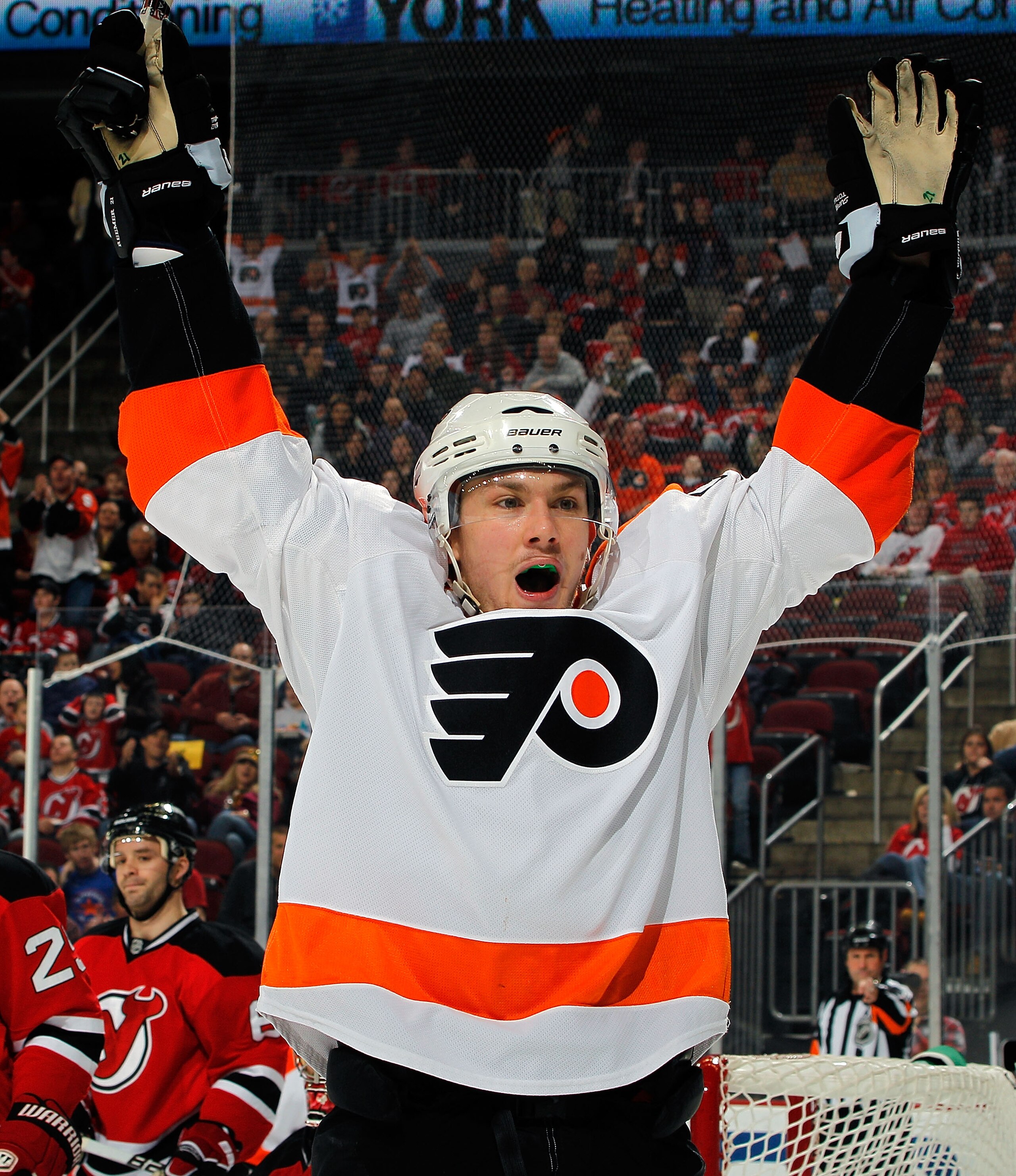 NEWARK, NJ - APRIL 01:  James van Riemsdyk #21 of the Philadelphia Flyers celebrates scoring a goal against the New Jersey Devils during the first period of an NHL hockey game at the Prudential Center on April 1, 2011 in Newark, New Jersey.  (Photo by Pau