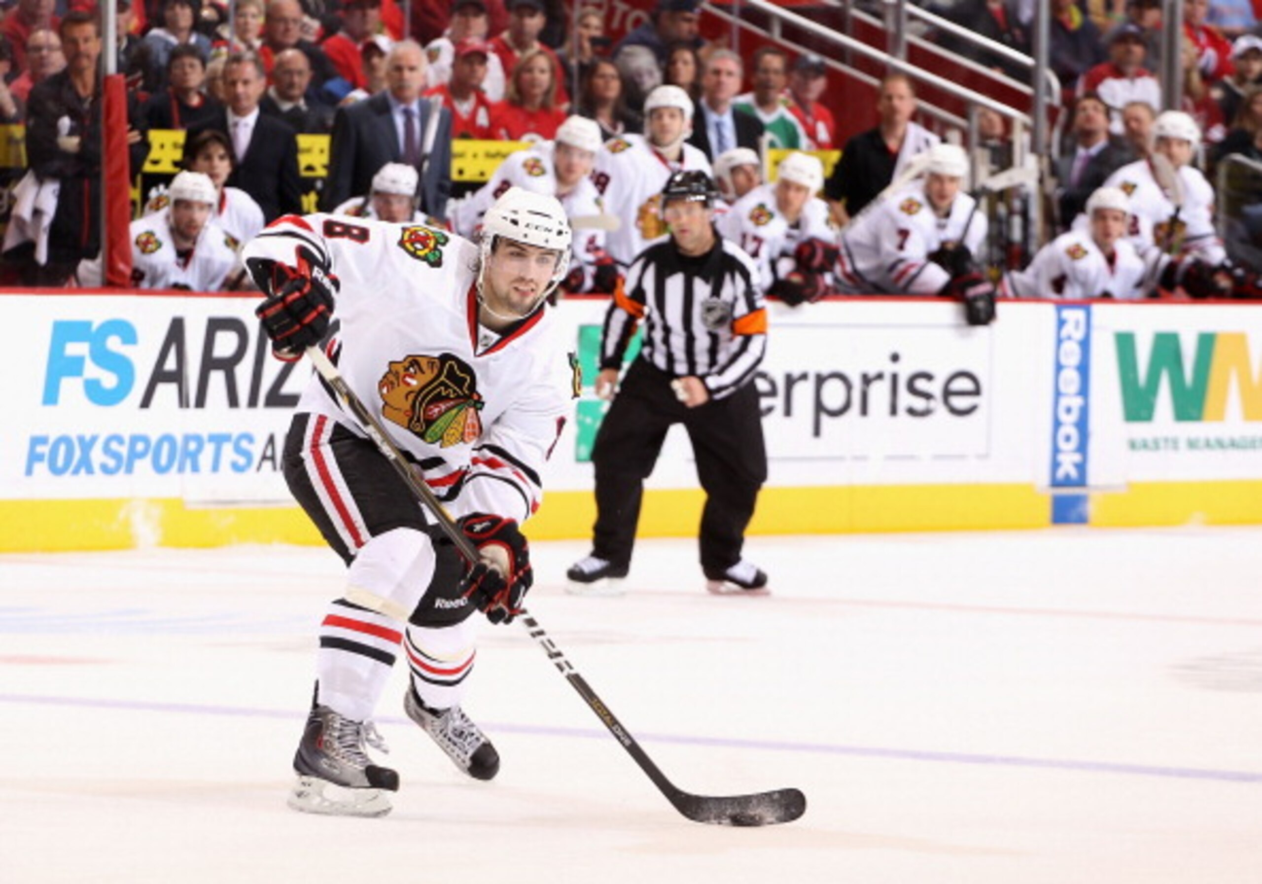 GLENDALE, AZ - MARCH 20:  Nick Leddy #8 of the Chicago Blackhawks skates with the puck during the NHL game against the Phoenix Coyotes at Jobing.com Arena on March 20, 2011 in Glendale, Arizona. The Blackhawks defeated the Coyotes 2-1.  (Photo by Christia