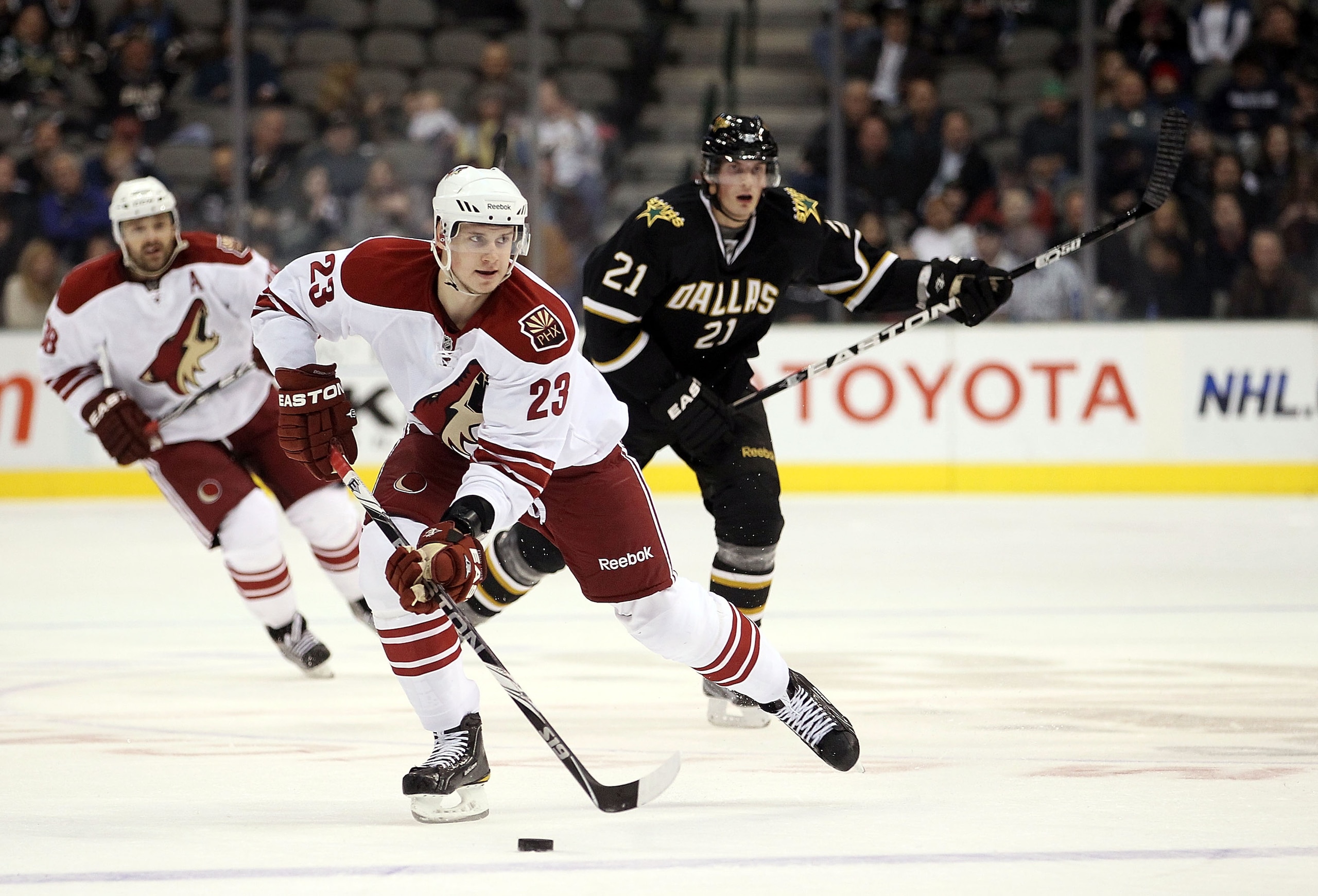 DALLAS, TX - FEBRUARY 09:  Defenseman Oliver Ekman-Larsson #23 of the Phoenix Coyotes skates the puck against the Dallas Stars at American Airlines Center on February 9, 2011 in Dallas, Texas.  (Photo by Ronald Martinez/Getty Images)