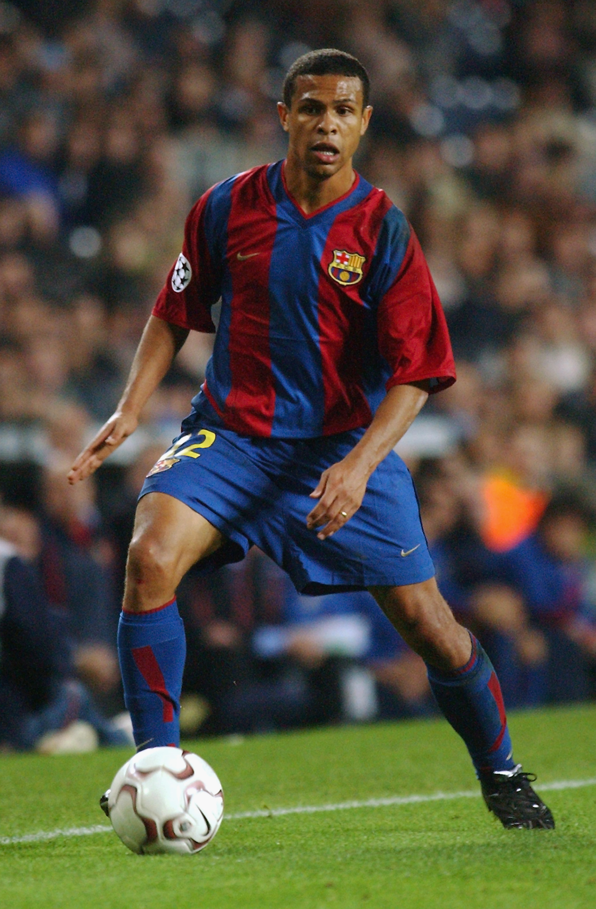 BARCELONA - NOVEMBER 13 :   Geovanni of Barcelona in action during the Champions League Group H match between FC Barcelona and Galatasaray SK at the Nou Camp stadiun in Barcelona, Spain on 13 November, 2002. (Photo by Ross Kinnaird/Getty Images) Barcelona