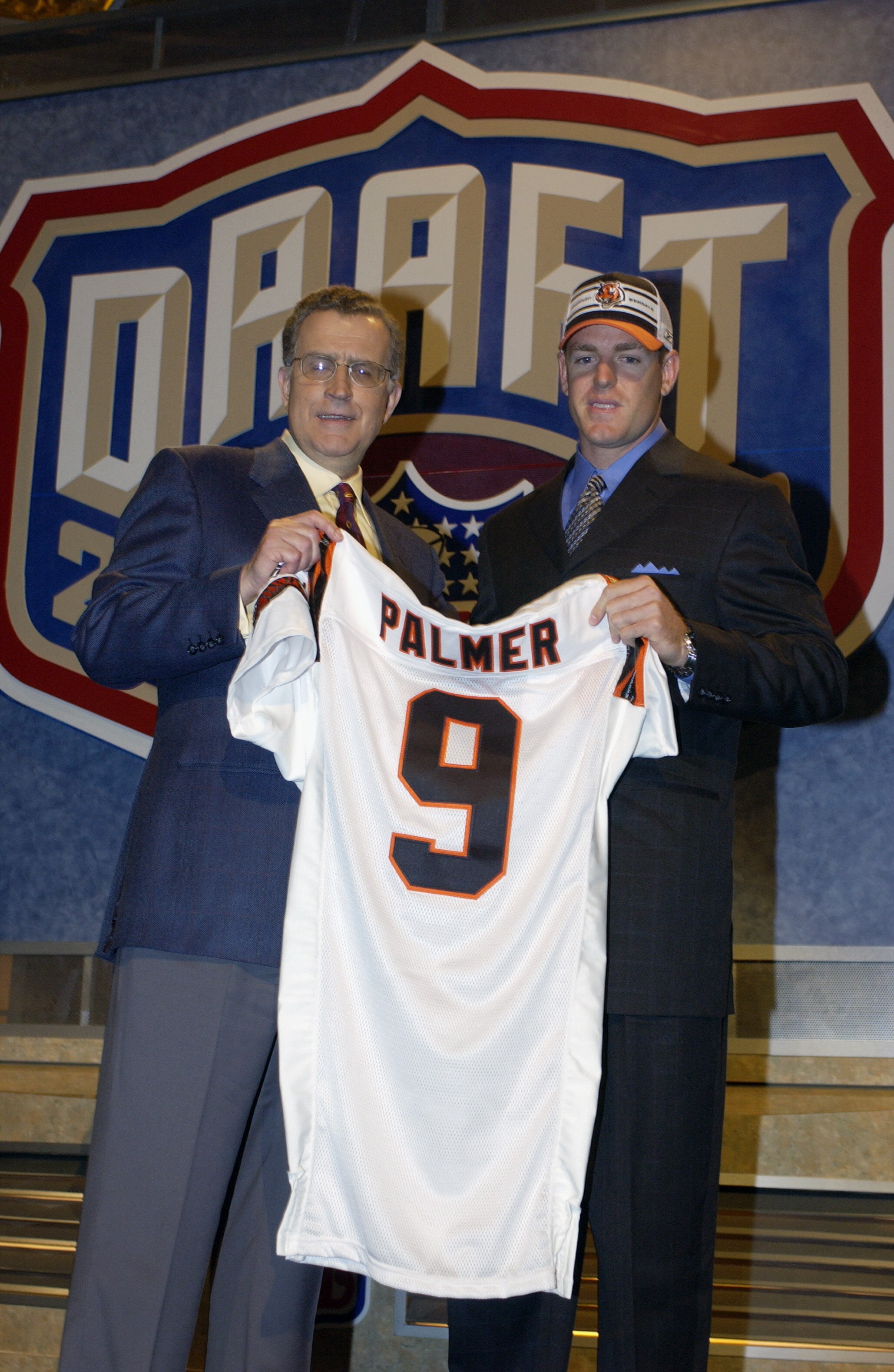 NEW YORK CITY - APRIL 26:  Carson Palmer from USC after being selected first by the Cincinnati Bengals with NFL Commissioner Paul Tagliabue at the 2003 NFL Draft on April 26, 2003 at Madison Square Garden in New York City. Palmer agreed to a $40 million/s