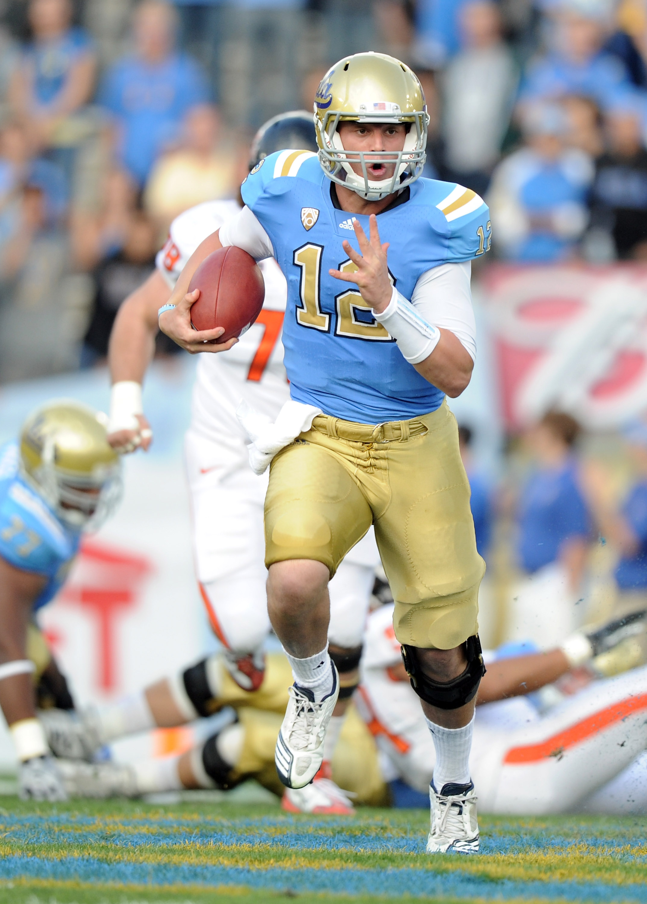 PASADENA, CA - NOVEMBER 06:  Richard Brehaut #12 of the UCLA Bruins runs down field against the Oregon State Beavers at the Rose Bowl on November 6, 2010 in Pasadena, California.  (Photo by Harry How/Getty Images)
