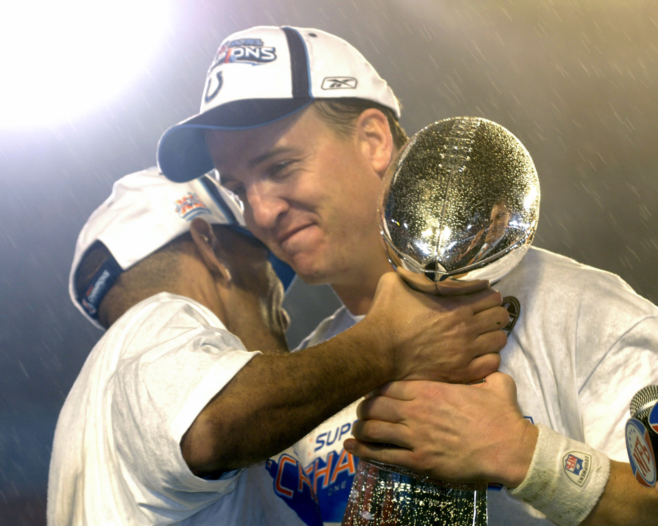 Tony Dungy and Peyton Manning after Super Bowl XLI between the Indianapolis Colts and Chicago Bears at Dolphin Stadium in Miami, Florida on February 4, 2007.  (Photo by A. Messerschmidt/Getty Images)