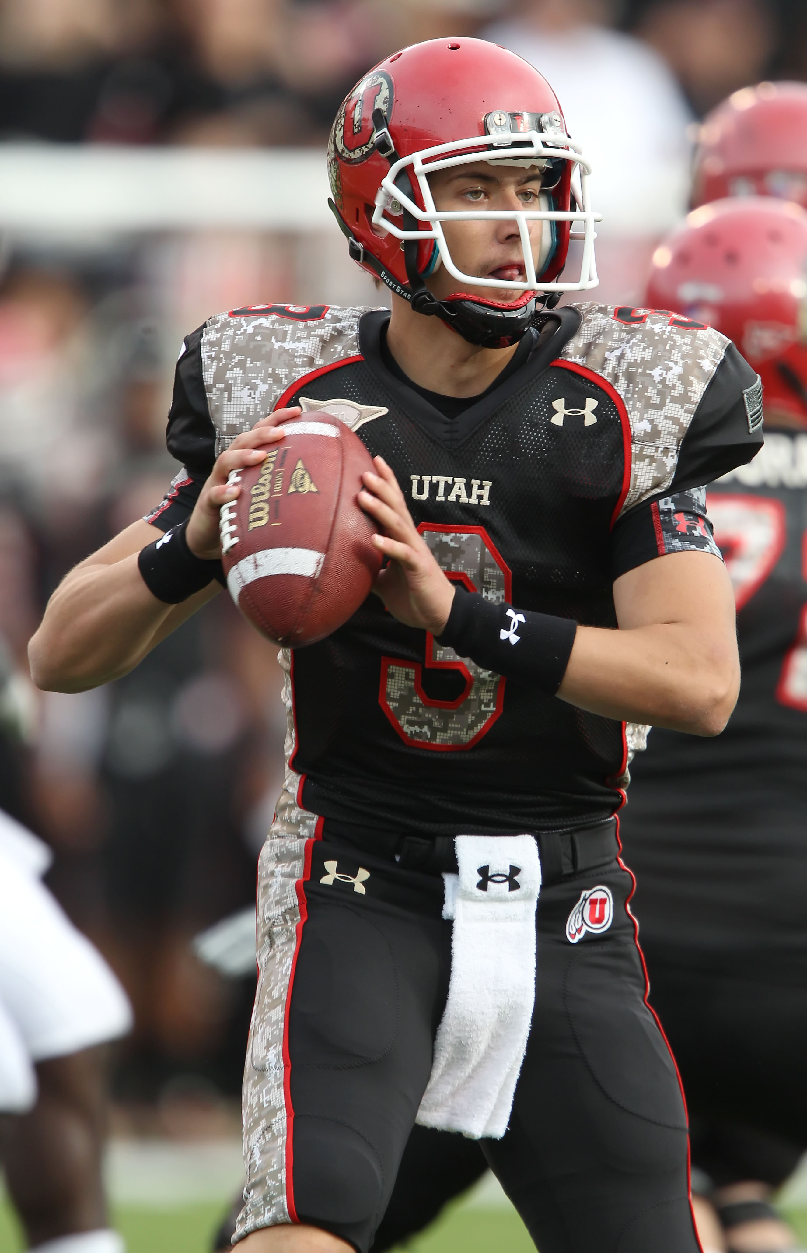 SALT LAKE CITY, UT - NOVEMBER 6: Quarterback Jordan Wynn #3 of the Utah Utes looks to throw a pass in a game against the TCU Horned Frogs during the second half of an NCAA Football game November 6, 2010 at Rice-Eccles Stadium in Salt Lake City, Utah. TCU
