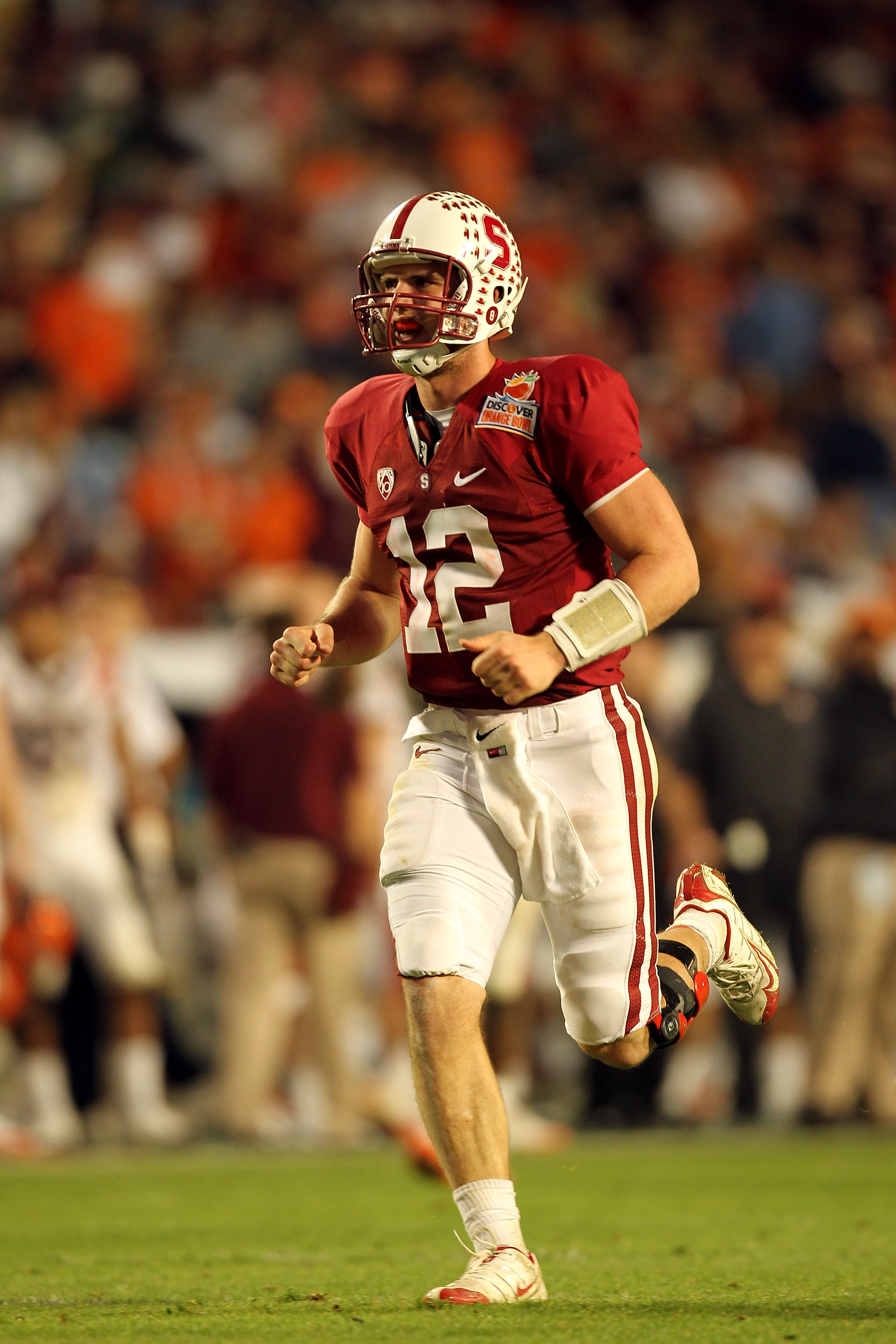 MIAMI, FL - JANUARY 03: Andrew Luck #12 of the Stanford Cardinal celebrates a play against the Virginia Tech Hokies during the 2011 Discover Orange Bowl at Sun Life Stadium on January 3, 2011 in Miami, Florida. Stanford won 40-12. (Photo by Mike Ehrmann/G