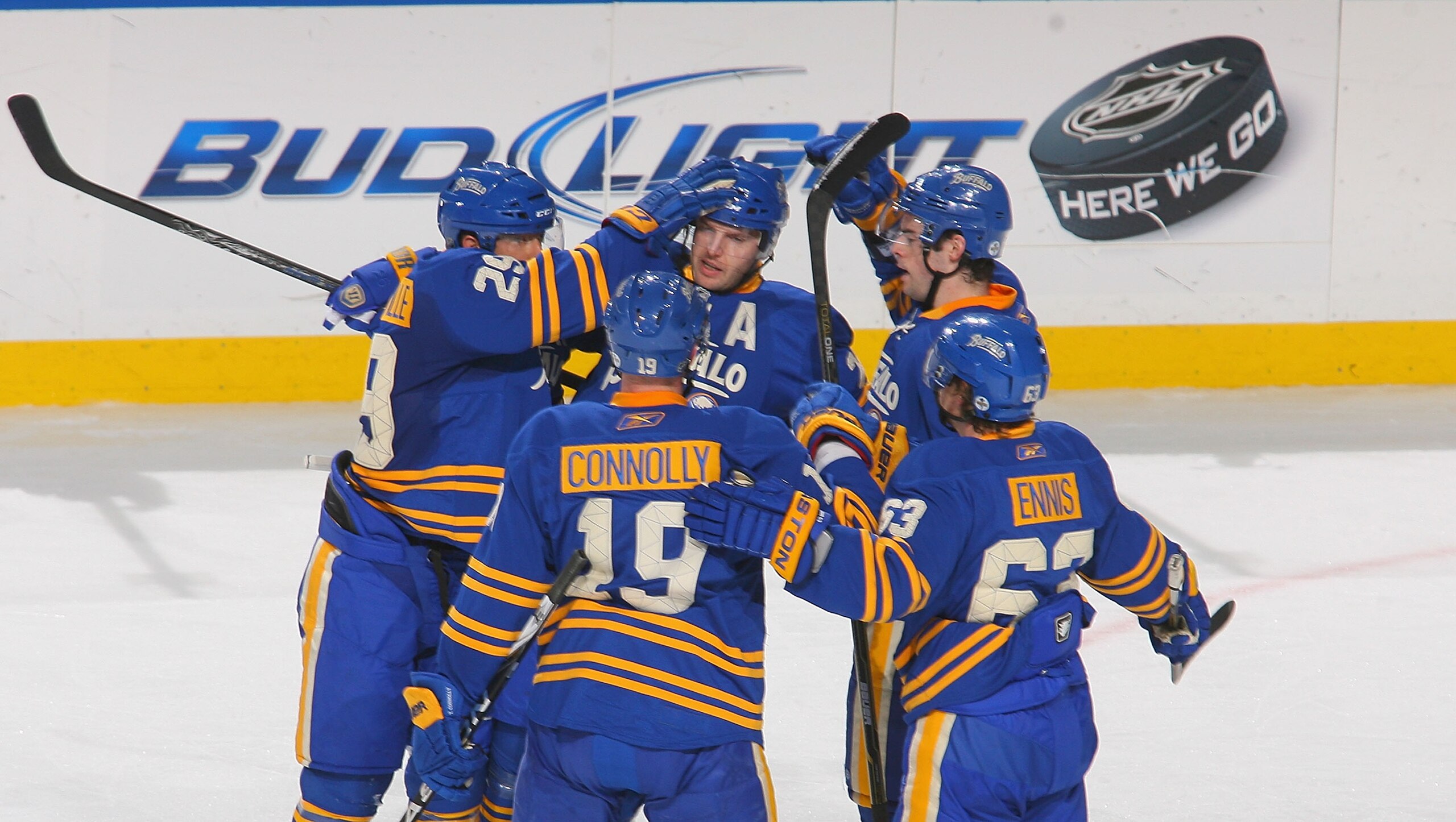 BUFFALO, NY - APRIL 05: Thomas Vanek #26 (Above-Center) of the Buffalo Sabres celebrates with teammates after scoring Buffalo's first goal against the Tampa Bay Lightning at HSBC Arena on April 5, 2011 in Buffalo, New York. (Photo by Rick Stewart/Getty I BUFFALO, NY - APRIL 05: Thomas Vanek #26 (Above-Center) of the Buffalo Sabres celebrates with teammates after scoring Buffalo's first goal against the Tampa Bay Lightning at HSBC Arena on April 5, 2011 in Buffalo, New York. (Photo by Rick Stewart/Getty I