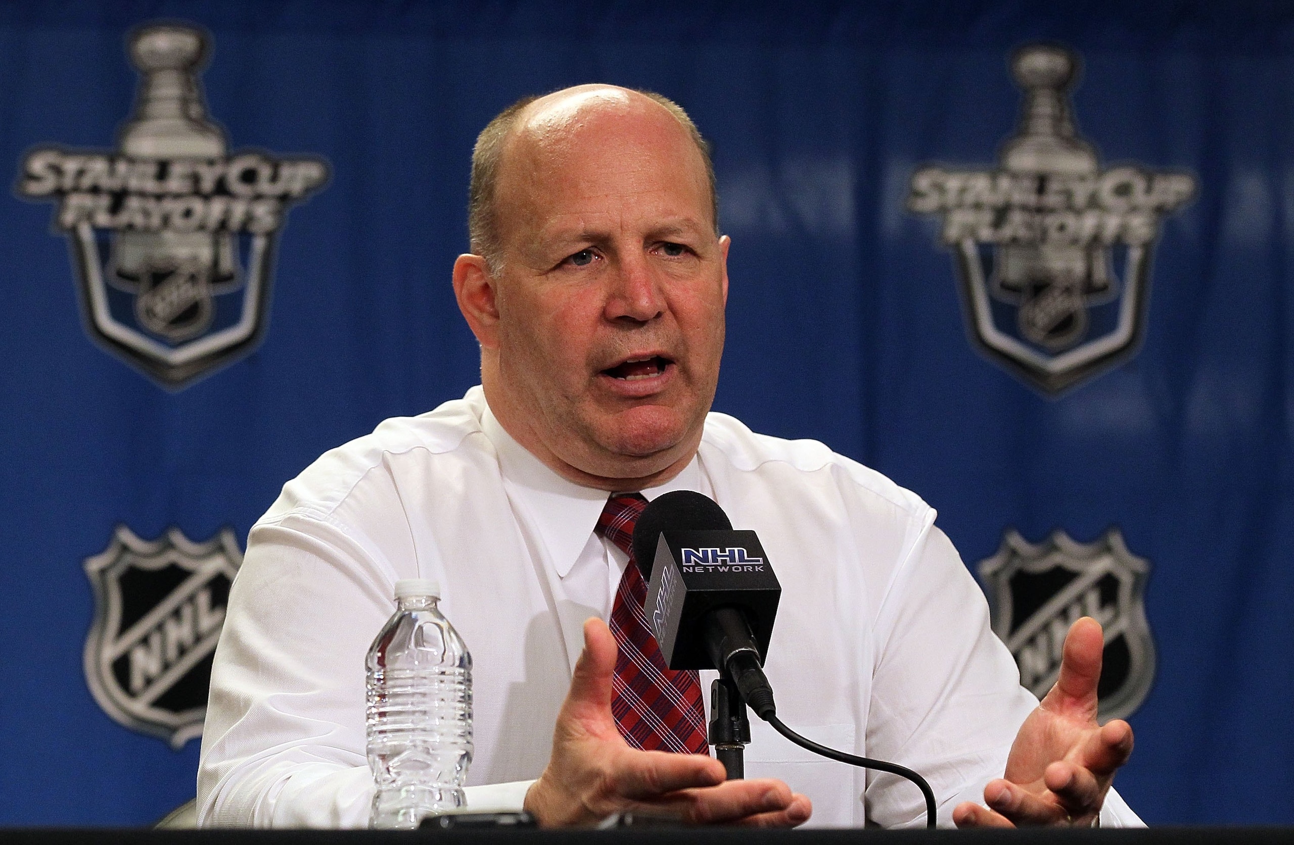 PHILADELPHIA - MAY 05:  Head coach Claude Julien of the Boston Bruins speaks to the media after his team defeated the Philadelphia Flyers in Game Three of the Eastern Conference Semifinals during the 2010 NHL Stanley Cup Playoffs at the Wachovia Center on