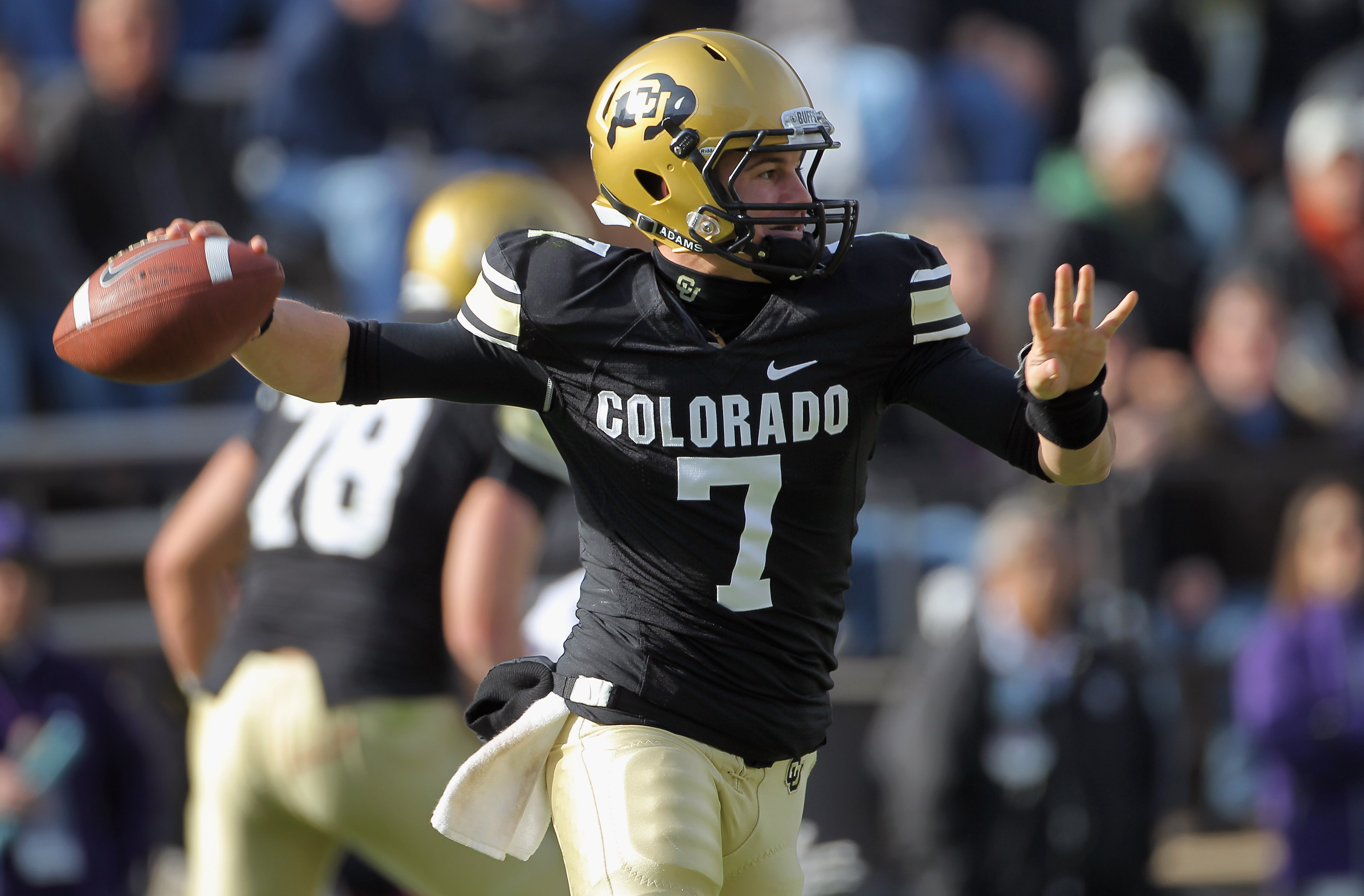BOULDER, CO - NOVEMBER 20:  Quarterback Cody Hawkins #7 of the Colorado Buffaloes delivers a pass against the Kansas State Wildcats at Folsom Field on November 20, 2010 in Boulder, Colorado. Colorado defeated Kansas State 44-36.  (Photo by Doug Pensinger/