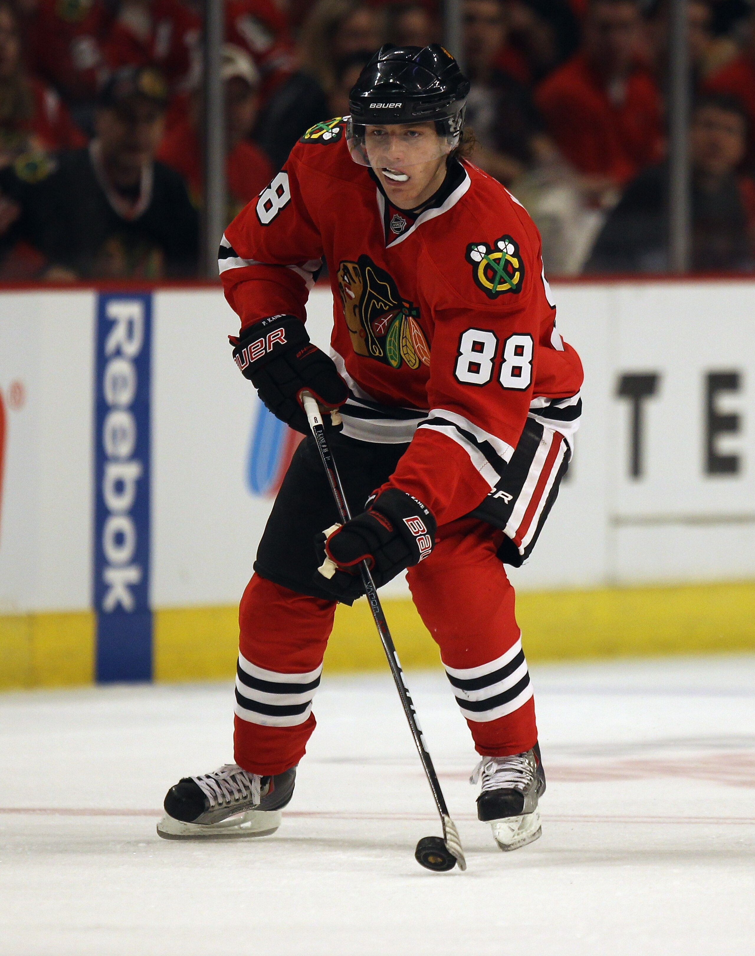 CHICAGO, IL - APRIL 10: Patrick Kane #88 of the Chicago Blackhawks controls the puck against the Detroit Red Wings at the United Center on April 10, 2011 in Chicago, Illinois. The Red Wings defeated the Blackhawks 4-3. (Photo by Jonathan Daniel/Getty Imag CHICAGO, IL - APRIL 10: Patrick Kane #88 of the Chicago Blackhawks controls the puck against the Detroit Red Wings at the United Center on April 10, 2011 in Chicago, Illinois. The Red Wings defeated the Blackhawks 4-3. (Photo by Jonathan Daniel/Getty Imag