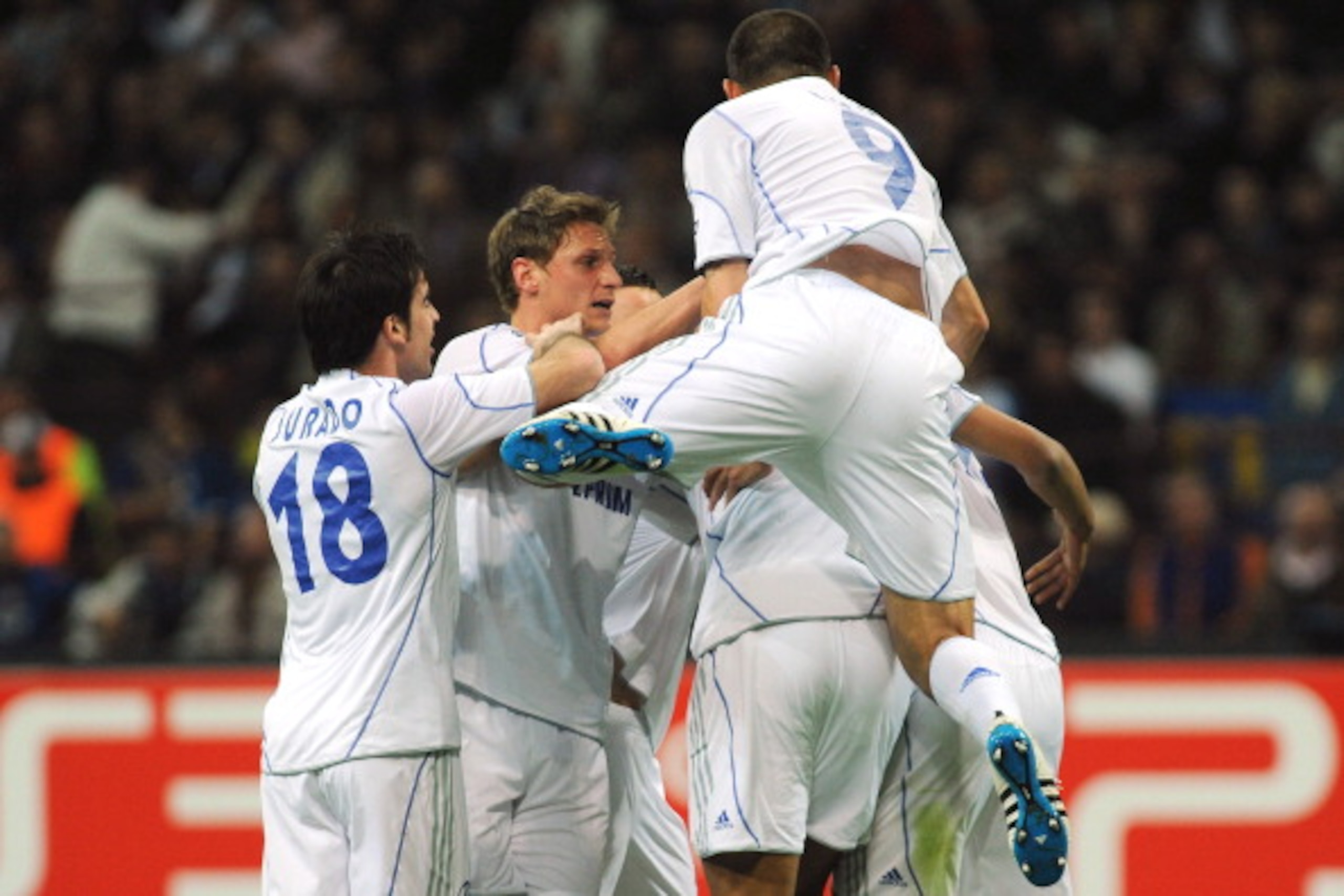 MILAN, ITALY - APRIL 05:  Joel Matip (C) of Schalke 04 celebrates with his team mates after scoring a goal during the UEFA Champions League Quarter Final match between FC Internazionale Milano and Schalke 04 at San Siro Stadium on April 5, 2011 in Milan,