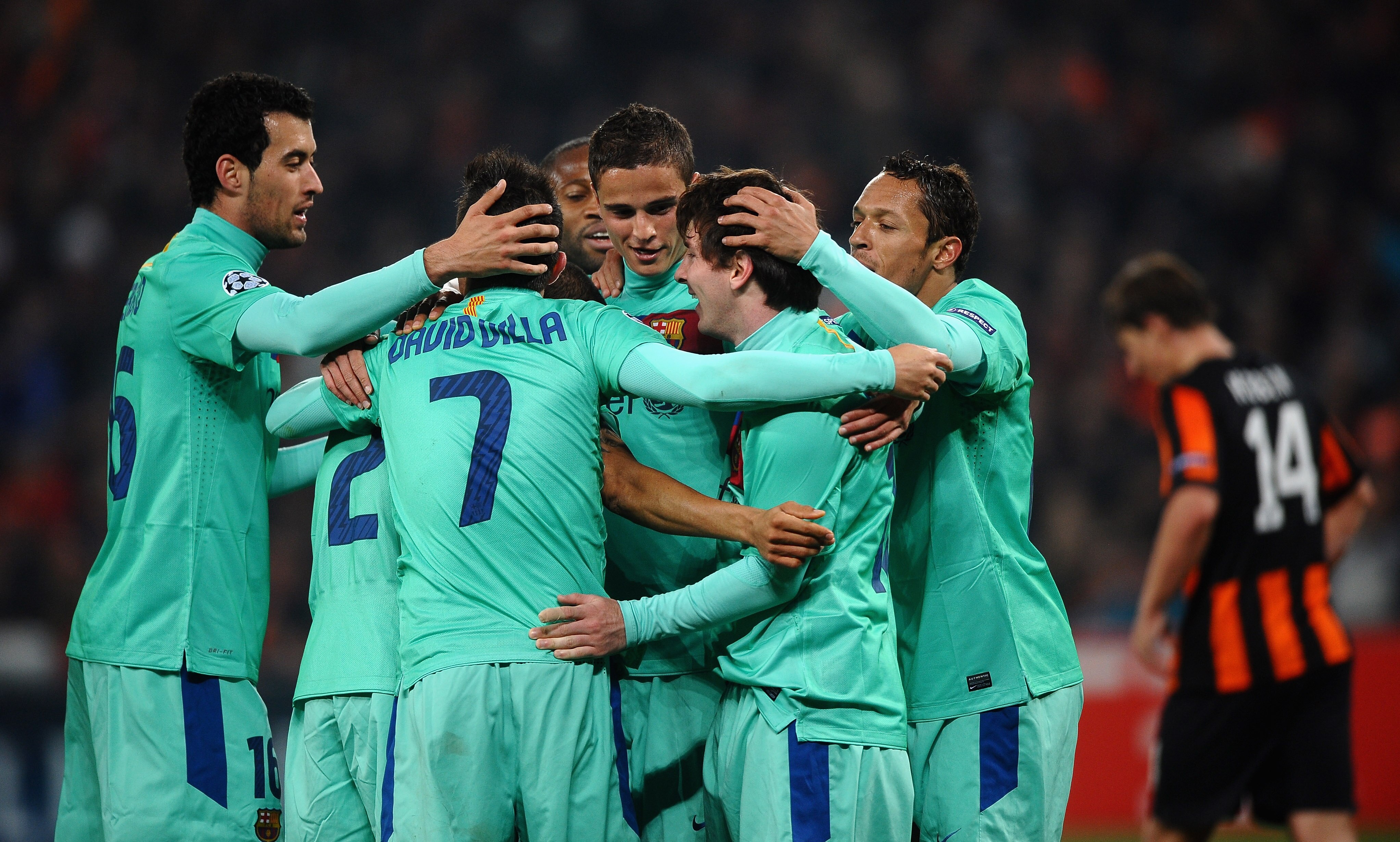 DONETSK, UKRAINE - APRIL 12:  Lionel Messi of Barcelona is congratulated on scoring the opening goal during the UEFA Champions League Quarter Final 2nd Leg match between Shakhtar Donetsk and Barcelona at the Donbass Arena on April 12, 2011 in Donetsk, Ukr