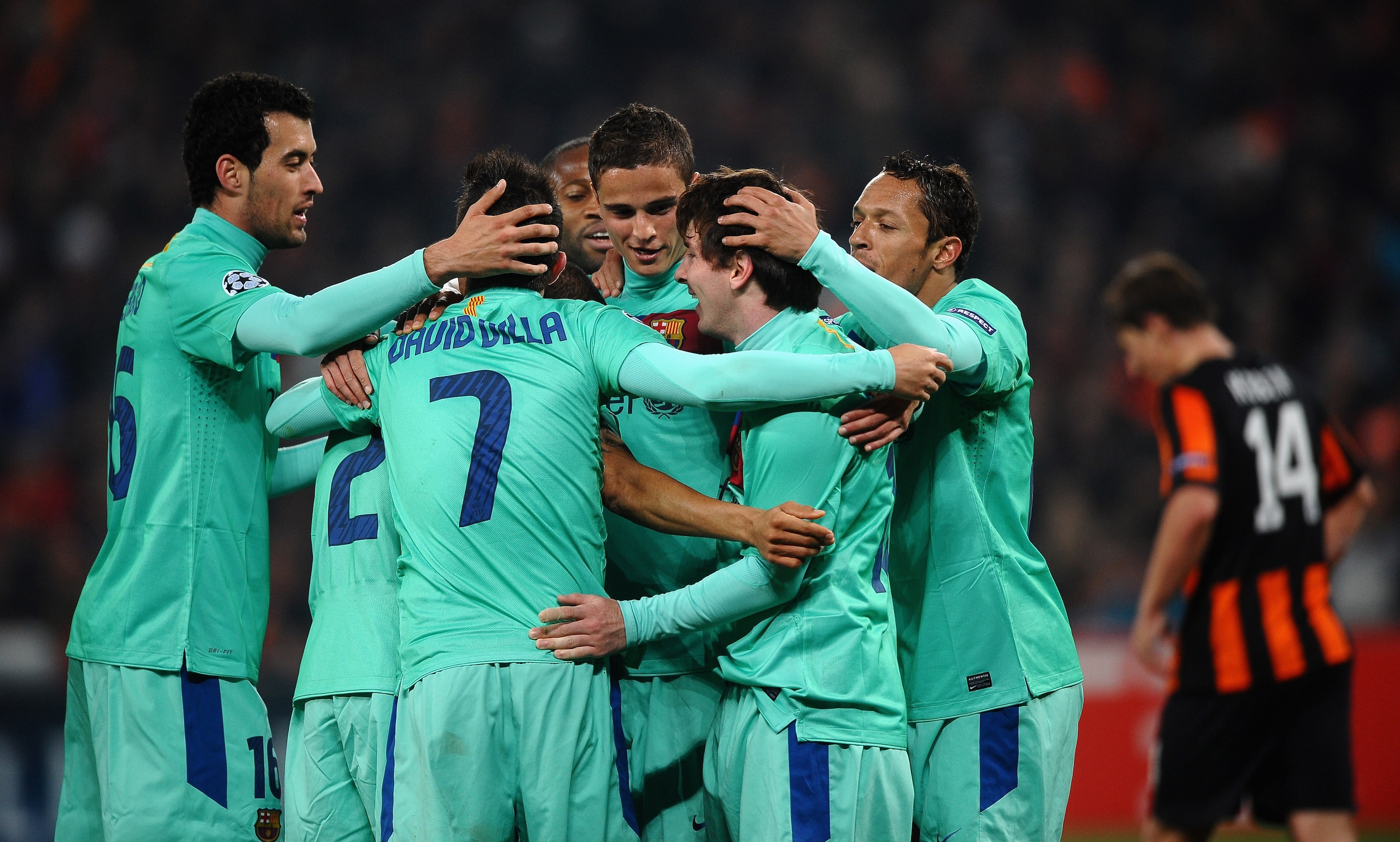 DONETSK, UKRAINE - APRIL 12:  Lionel Messi of Barcelona is congratulated on scoring the opening goal during the UEFA Champions League Quarter Final 2nd Leg match between Shakhtar Donetsk and Barcelona at the Donbass Arena on April 12, 2011 in Donetsk, Ukr