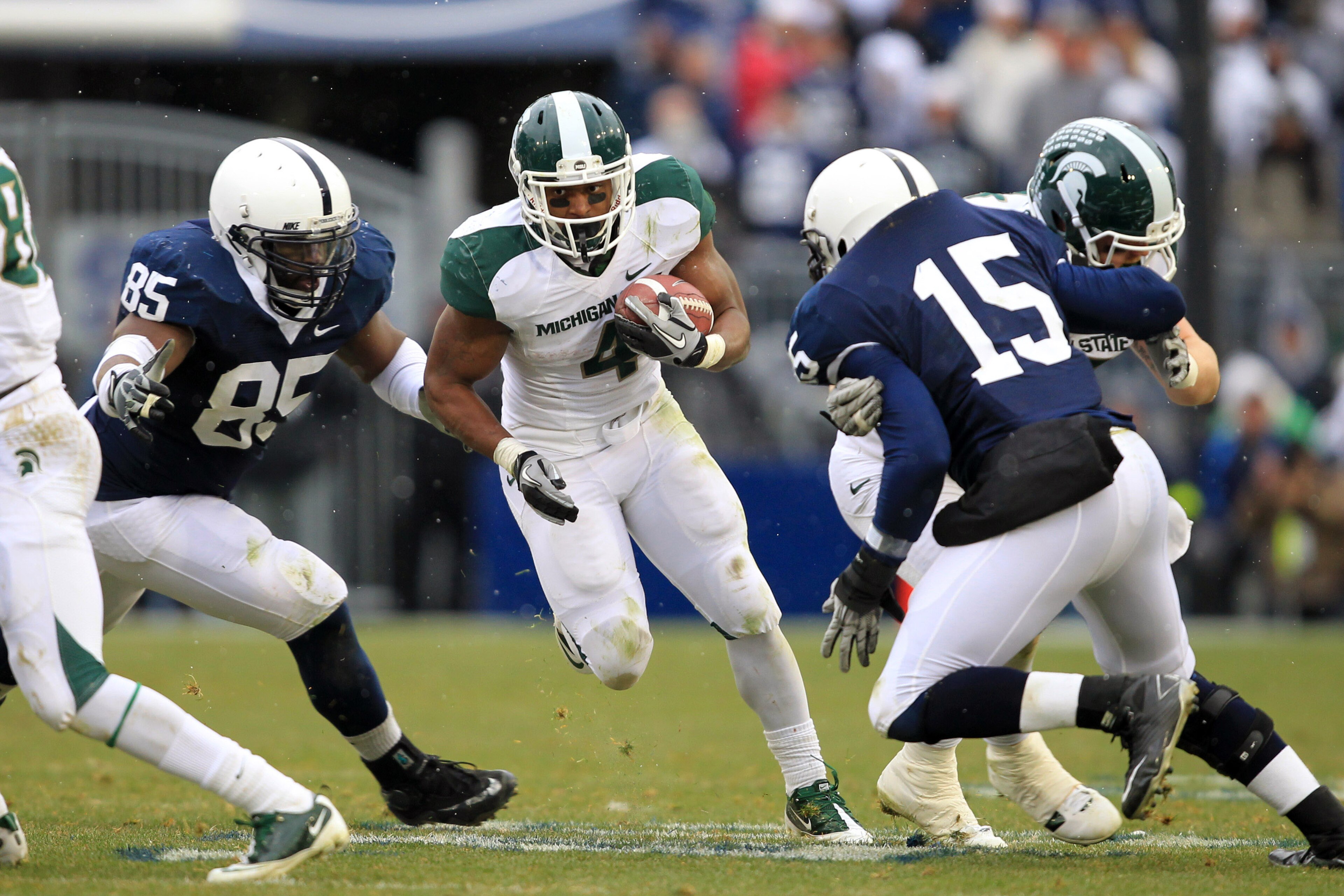 STATE COLLEGE, PA - NOVEMBER 27: Running back Edwin Baker #4 of the Michigan State Spartans carries the ball during a game against the Penn State Nittany Lions on November 27, 2010 at Beaver Stadium in State College, Pennsylvania. The Spartans won 28-22.( STATE COLLEGE, PA - NOVEMBER 27: Running back Edwin Baker #4 of the Michigan State Spartans carries the ball during a game against the Penn State Nittany Lions on November 27, 2010 at Beaver Stadium in State College, Pennsylvania. The Spartans won 28-22.(