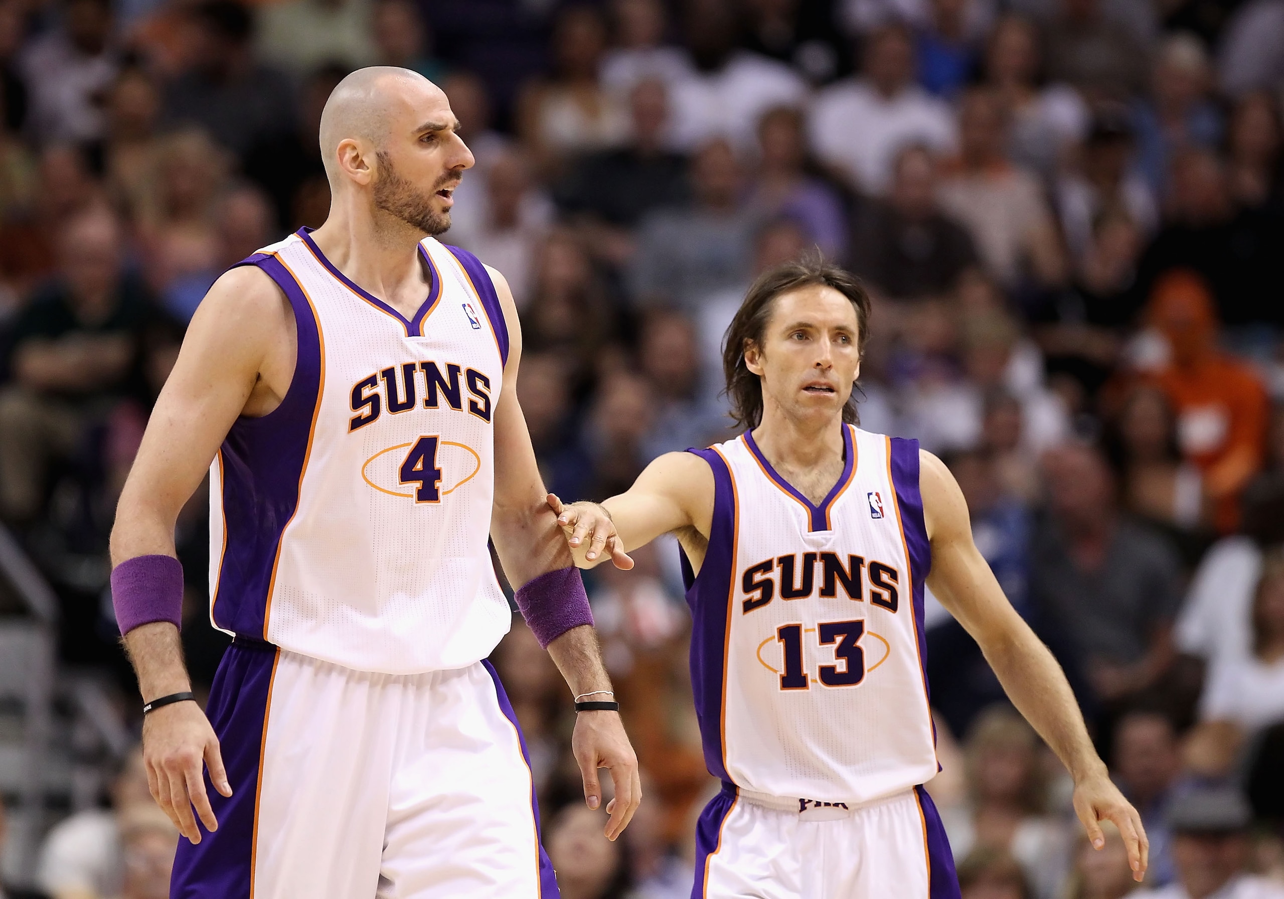 PHOENIX, AZ - MARCH 30:  Marcin Gortat #4 and Steve Nash #13 of the Phoenix Suns during the NBA game against the Oklahoma City Thunder at US Airways Center on March 30, 2011 in Phoenix, Arizona.  The Thunder defeated the Suns 116-98. NOTE TO USER: User ex