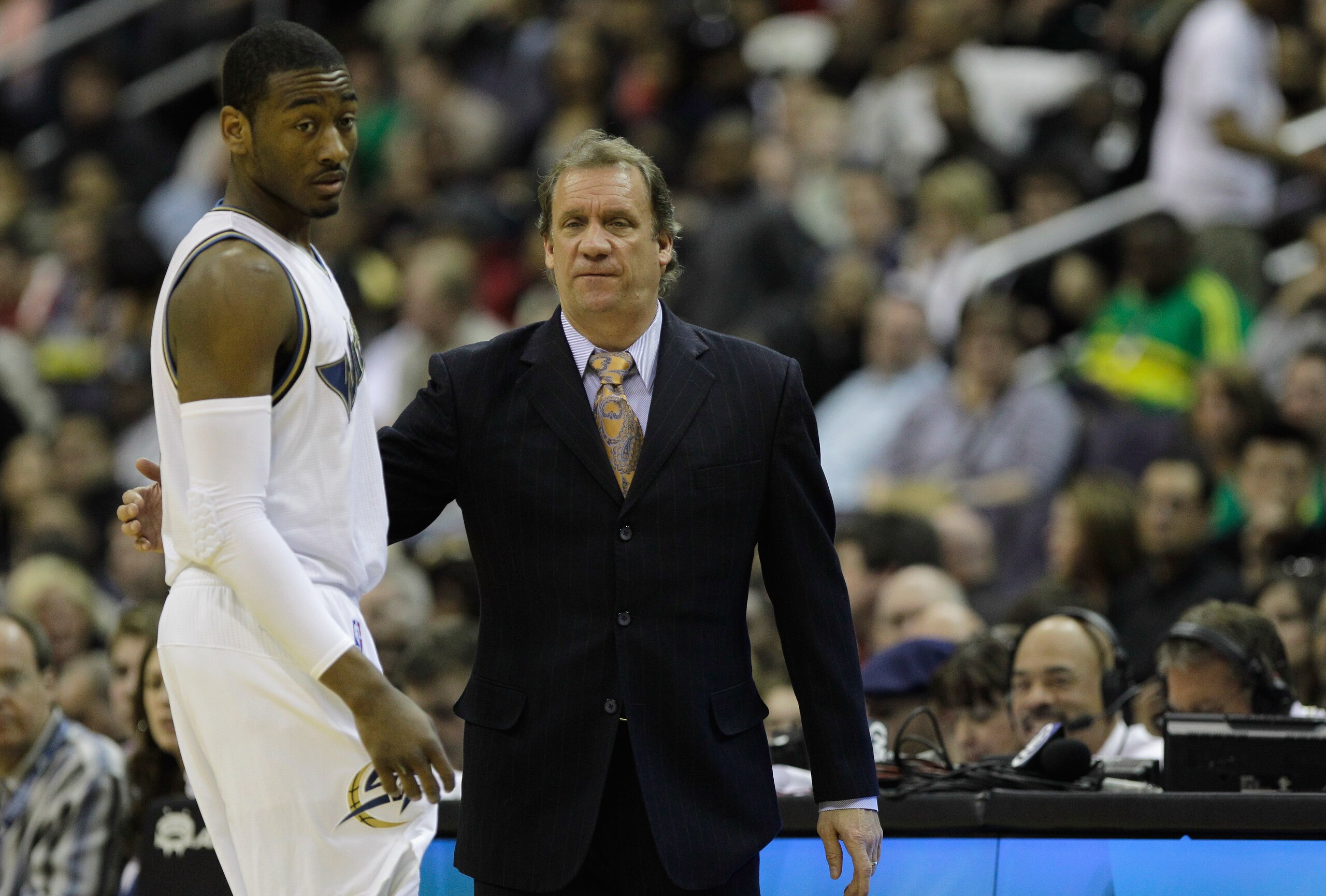 WASHINGTON, DC - FEBRUARY 26: Head coach Flip Saunders (R) talks with John Wall #2 of the Washington Wizards against the Dallas Mavericks at the Verizon Center on February 26, 2011 in Washington, DC. NOTE TO USER: User expressly acknowledges and agrees th