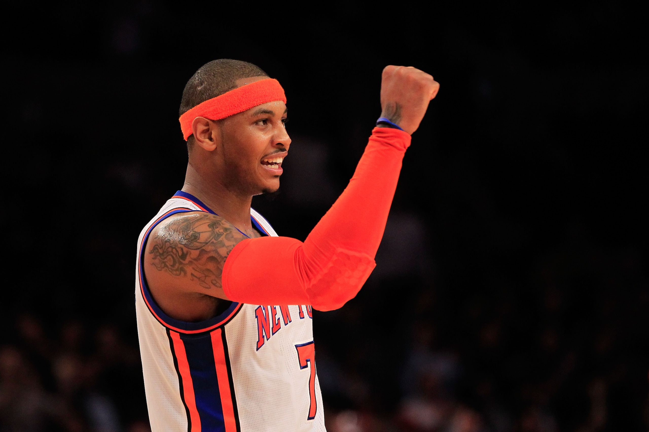 NEW YORK, NY - MARCH 30:  Carmelo Anthony #7 of the New York Knicks celebrates during the game against the New Jersey Nets at Madison Square Garden on March 30, 2011 in New York City. NOTE TO USER: User expressly acknowledges and agrees that, by downloadi