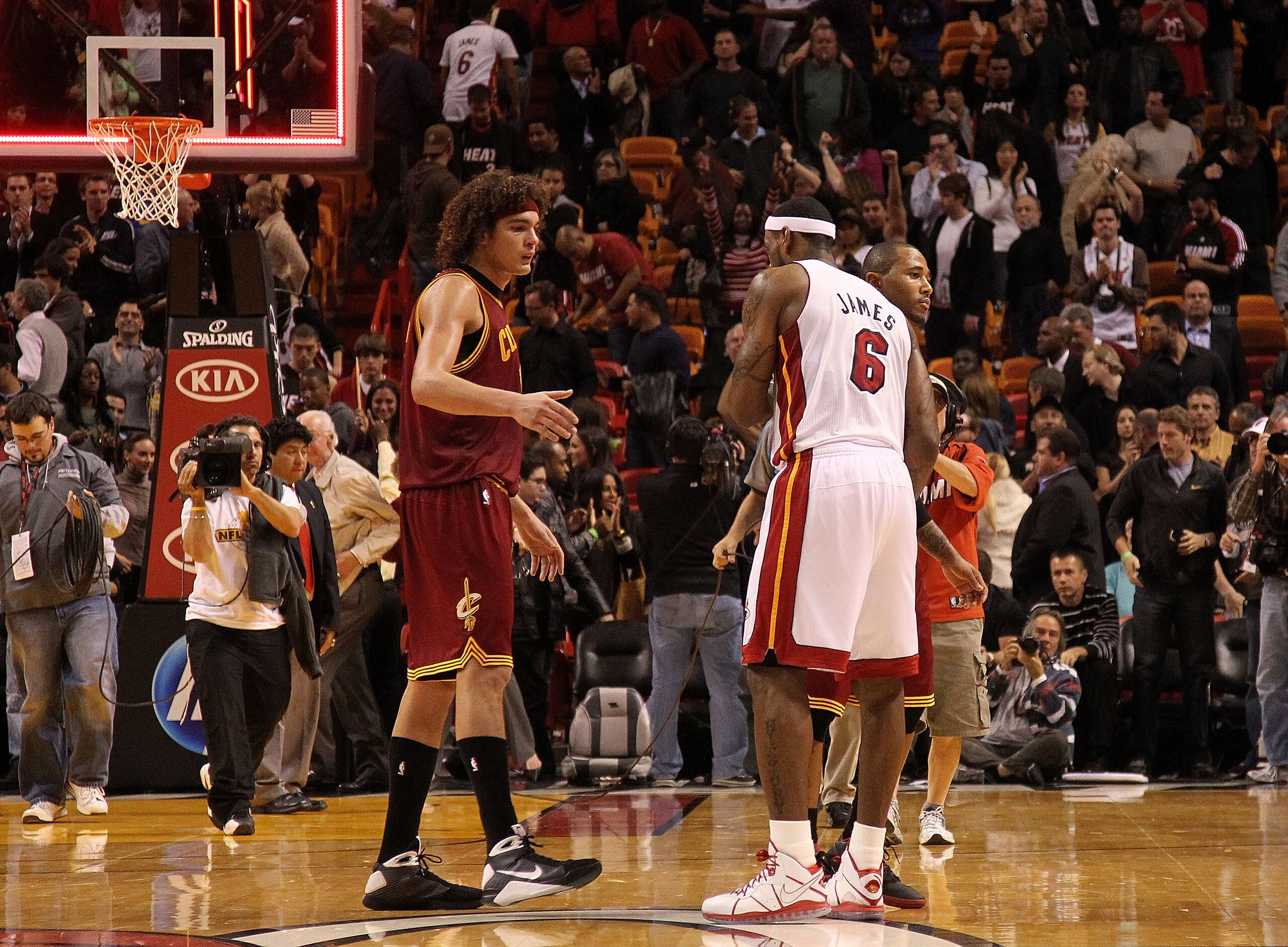 MIAMI, FL - DECEMBER 15:  LeBron James #6 of the Miami Heat shakes hands with Mo Williams #2 and Anderson Varejao #17 of the Cleveland Cavaliers during a game at American Airlines Arena on December 15, 2010 in Miami, Florida. NOTE TO USER: User expressly