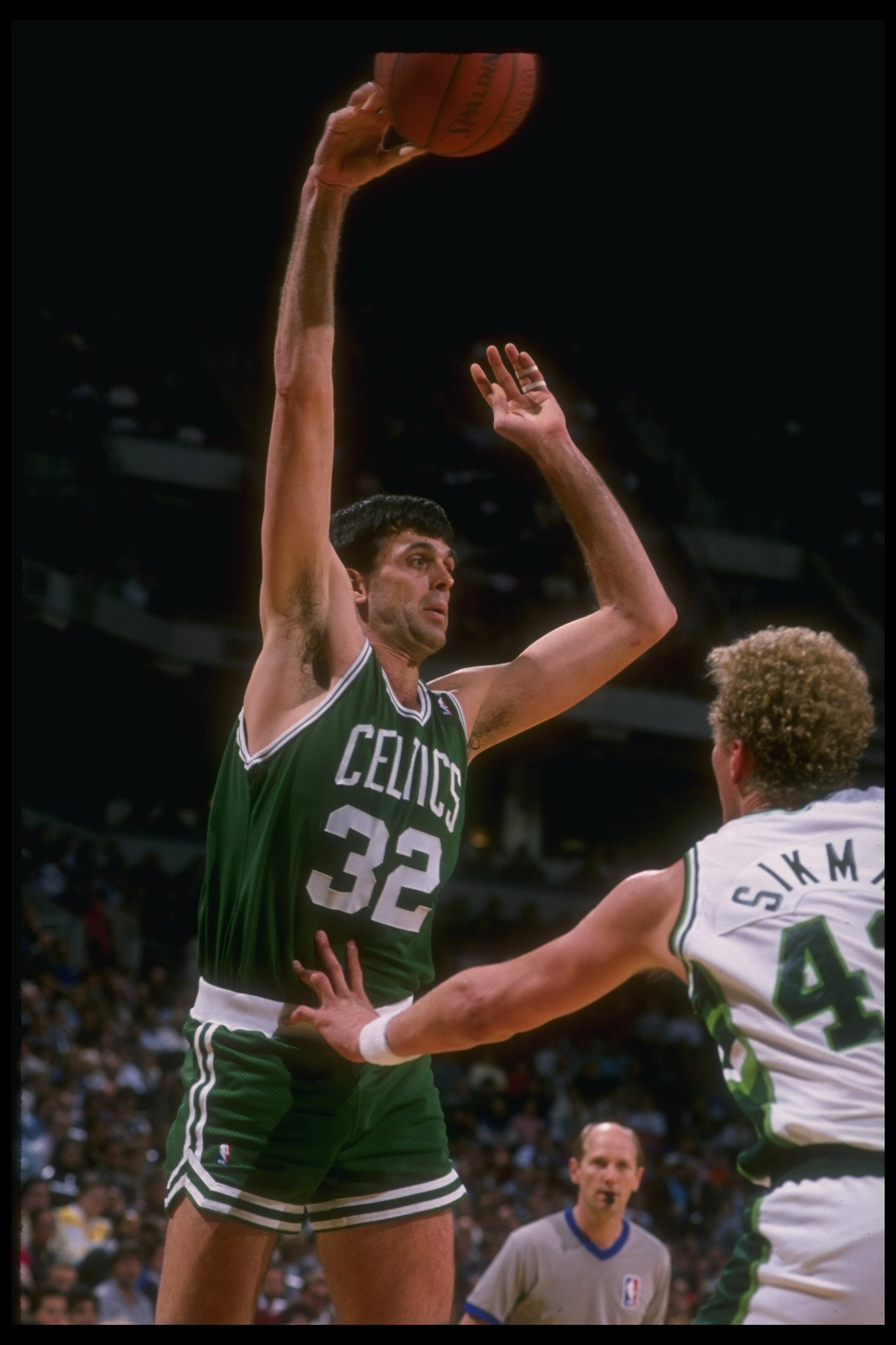 MILWAUKEE - 1988-1989: Forward Kevin McHale of the Boston Celtics shoots the ball during the 1988-1989 NBA game against the Milwaukee Bucks at the Bradley Center in Milwaukee, Wisconsin. NOTE TO USER: User expressly acknowledges and agrees that, by downl MILWAUKEE - 1988-1989: Forward Kevin McHale of the Boston Celtics shoots the ball during the 1988-1989 NBA game against the Milwaukee Bucks at the Bradley Center in Milwaukee, Wisconsin. NOTE TO USER: User expressly acknowledges and agrees that, by downl