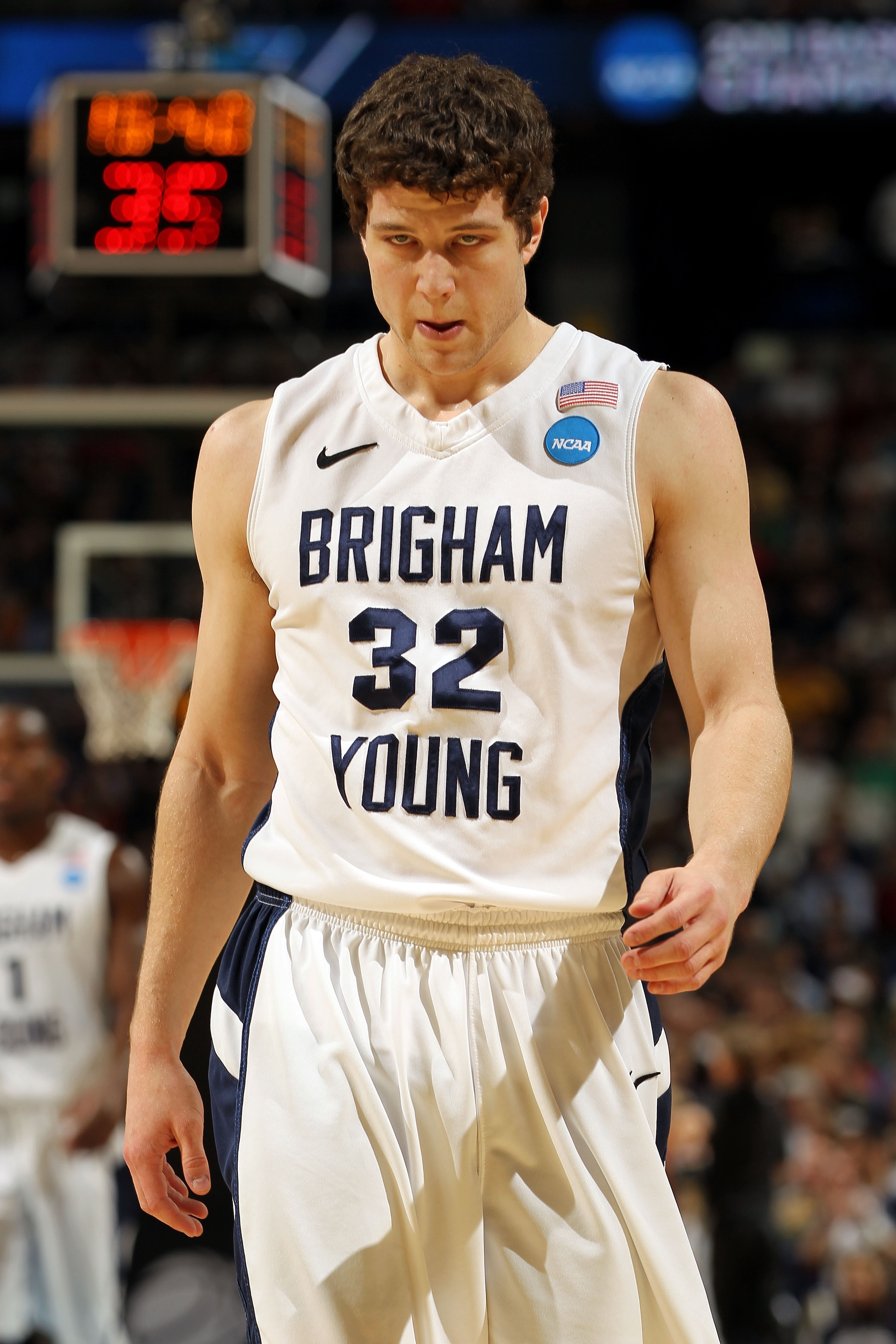 DENVER, CO - MARCH 19:  Jimmer Fredette #32 of the Brigham Young Cougars looks on against the Gonzaga Bulldogs during the third round of the 2011 NCAA men's basketball tournament at Pepsi Center on March 19, 2011 in Denver, Colorado.  (Photo by Doug Pensi