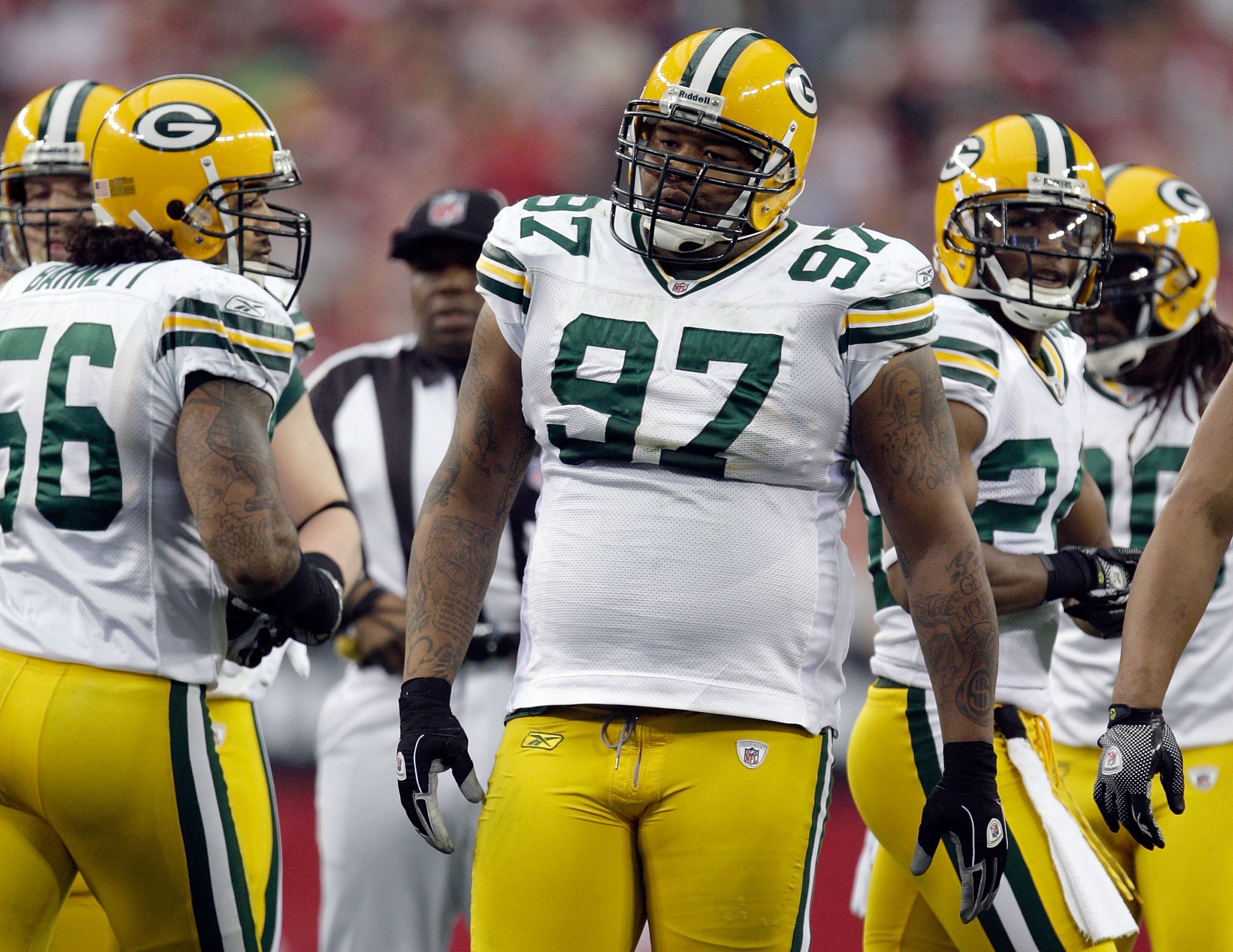 GLENDALE, AZ - JANUARY 03:  Johnny Jolly #97 of the Green Bay Packers looks on from the field against the Arizona Cardinals at University of Phoenix Stadium on January 3, 2010 in Glendale, Arizona.  (Photo by Jamie Squire/Getty Images)