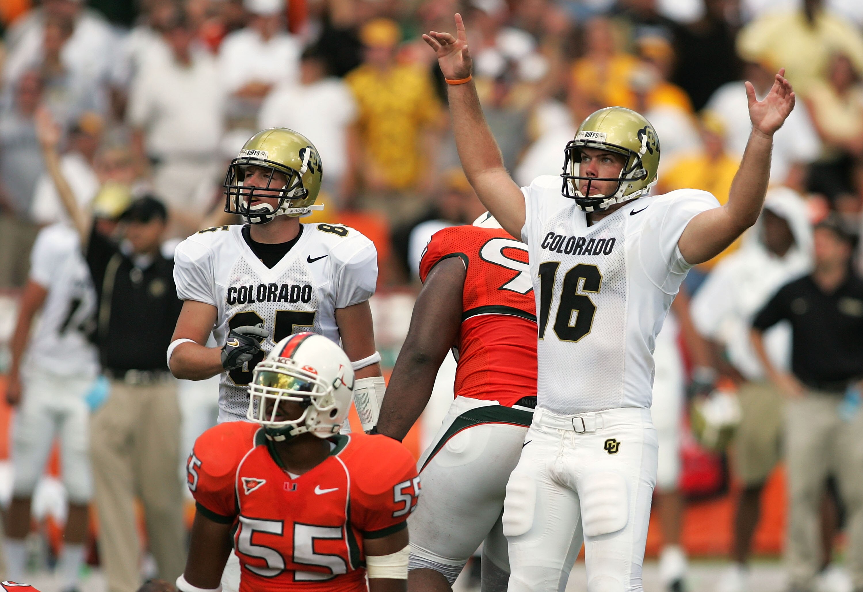 MIAMI - SEPTEMBER 24:  Place kicker Mason Crosby #16 of the Colorado Buffaloes celebrates his 58 yard field goal as teammate Nick Holz #85 and Glenn Cook #55 of the Miami Hurricanes watch on September 24, 2005 in Miami, Florida. Miami defeated Colorado 23