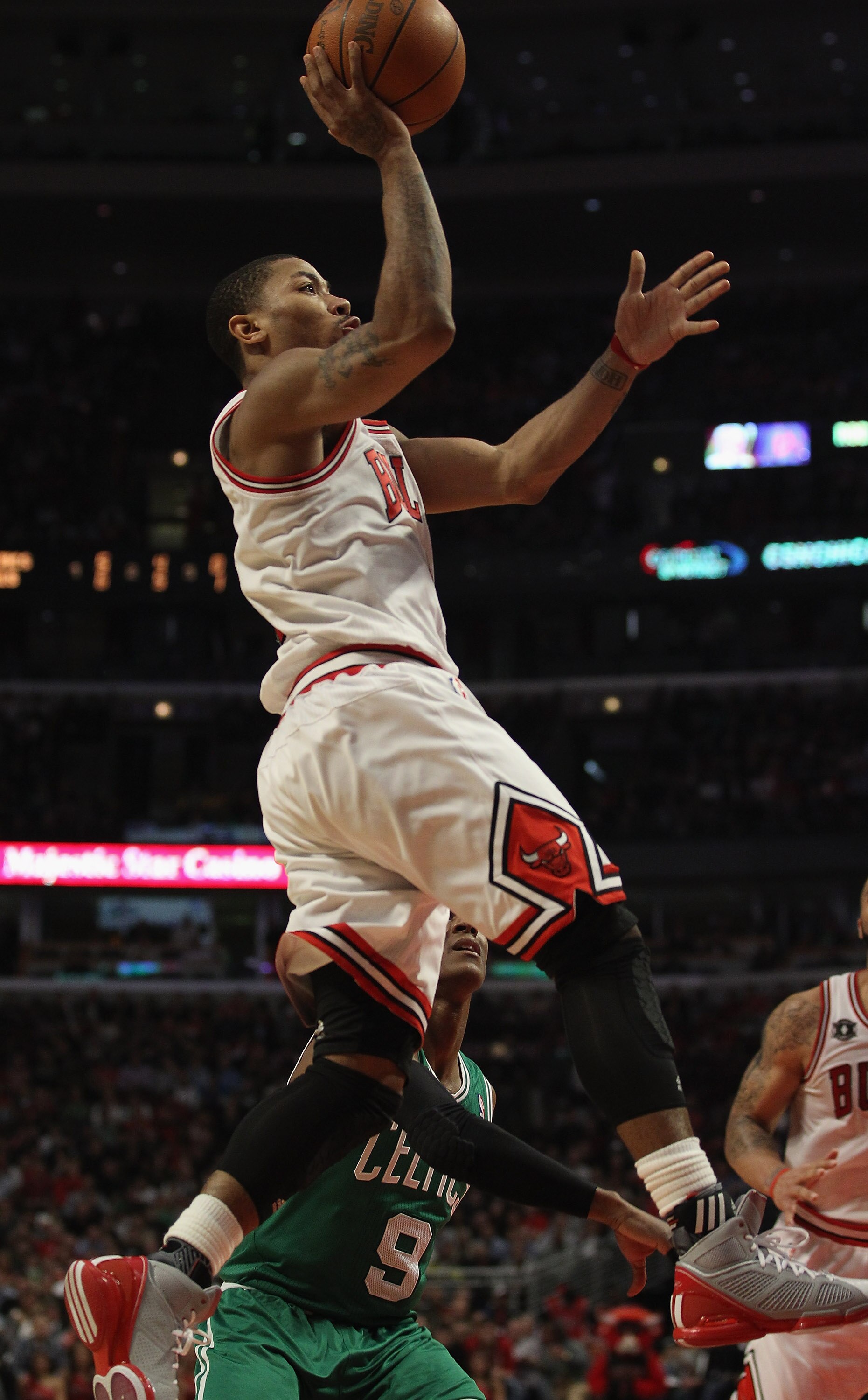 CHICAGO, IL - APRIL 07: Derrick Rose #1 of the Chicago Bulls puts up a shot against the Boston Celtics at United Center on April 7, 2011 in Chicago, Illinois. The Bulls defeated the Celtics 97-81. NOTE TO USER: User expressly acknowledges and agress that,