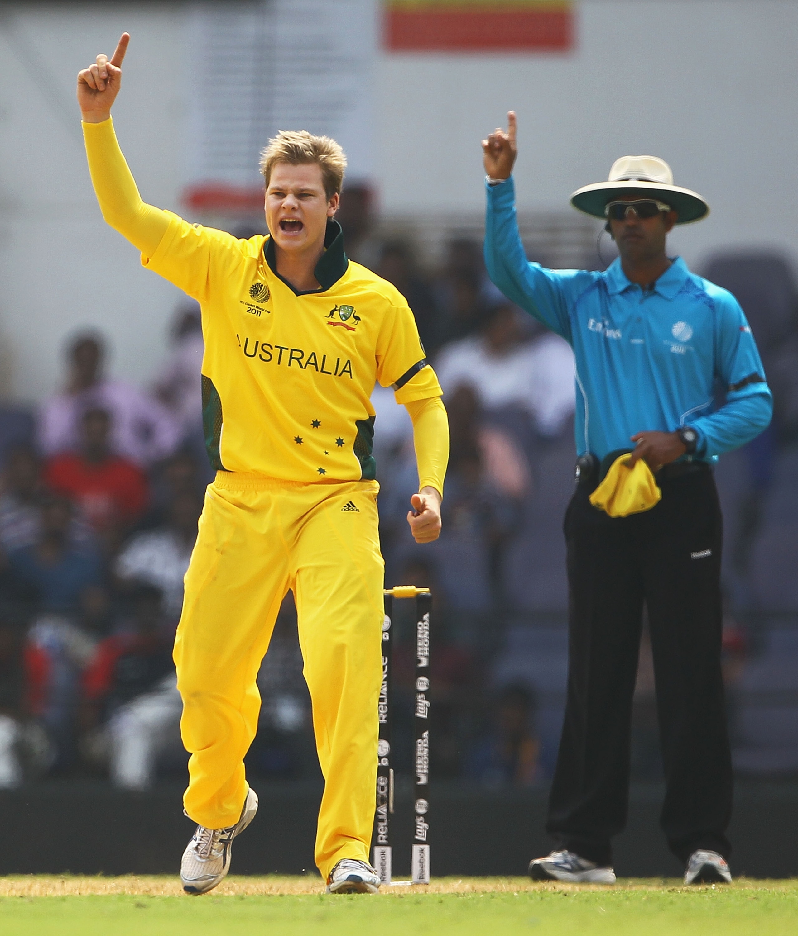 NAGPUR, INDIA - FEBRUARY 25: Steven Smith of Australia celebrates the wicket of Jamie How of New Zealand, after he bowled him LBW during the 2011 ICC World Cup Group A match between Australia and New Zealand at Vidarbha Cricket Association Ground on Febr NAGPUR, INDIA - FEBRUARY 25: Steven Smith of Australia celebrates the wicket of Jamie How of New Zealand, after he bowled him LBW during the 2011 ICC World Cup Group A match between Australia and New Zealand at Vidarbha Cricket Association Ground on Febr
