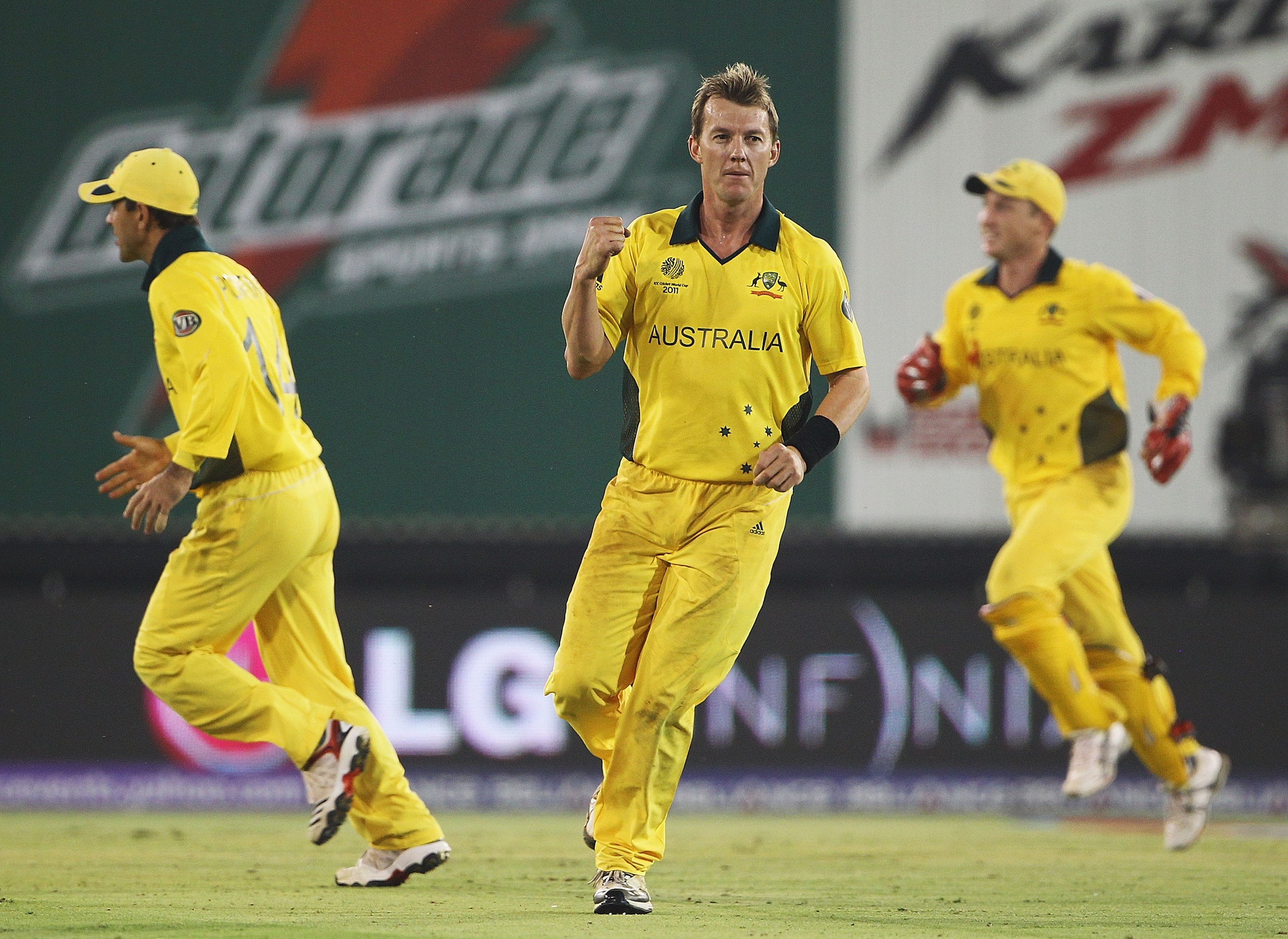 AHMEDABAD, INDIA - MARCH 24: Brett Lee of Australia celebrates the wicket of MS Dhoni of India, after he was caught by Michael Clarke during the 2011 ICC World Cup Quarter Final match between Australia and India at Sardar Patel Stadium on March 24, 2011 AHMEDABAD, INDIA - MARCH 24: Brett Lee of Australia celebrates the wicket of MS Dhoni of India, after he was caught by Michael Clarke during the 2011 ICC World Cup Quarter Final match between Australia and India at Sardar Patel Stadium on March 24, 2011