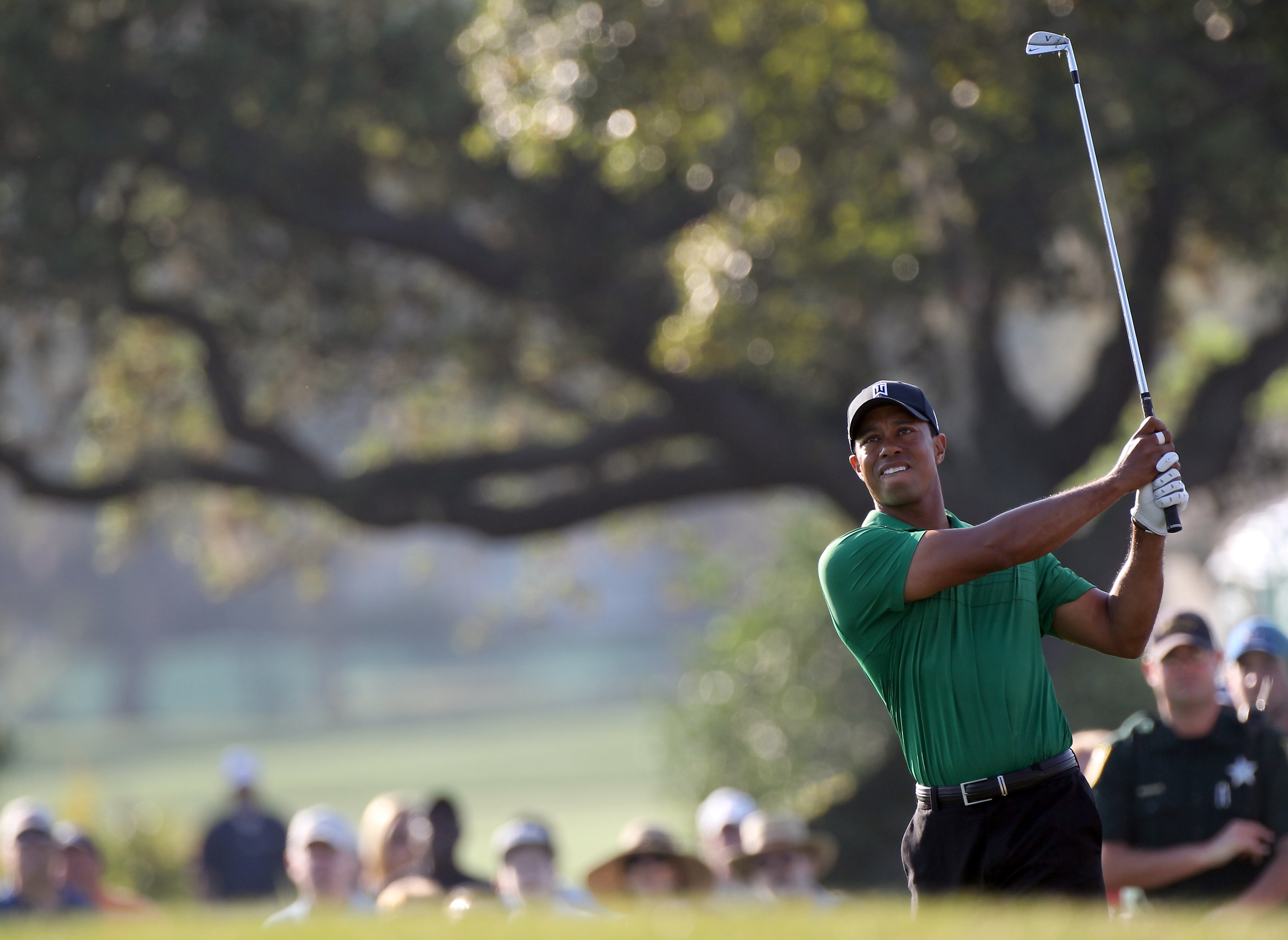 ORLANDO, FL - MARCH 25:  Tiger Woods plays a shot on the 13th hole during the second round of the Bay Hill Invitational presented by MasterCard at the Bay Hill Club and Lodge on March 25, 2011 in Orlando, Florida.  (Photo by Sam Greenwood/Getty Images)