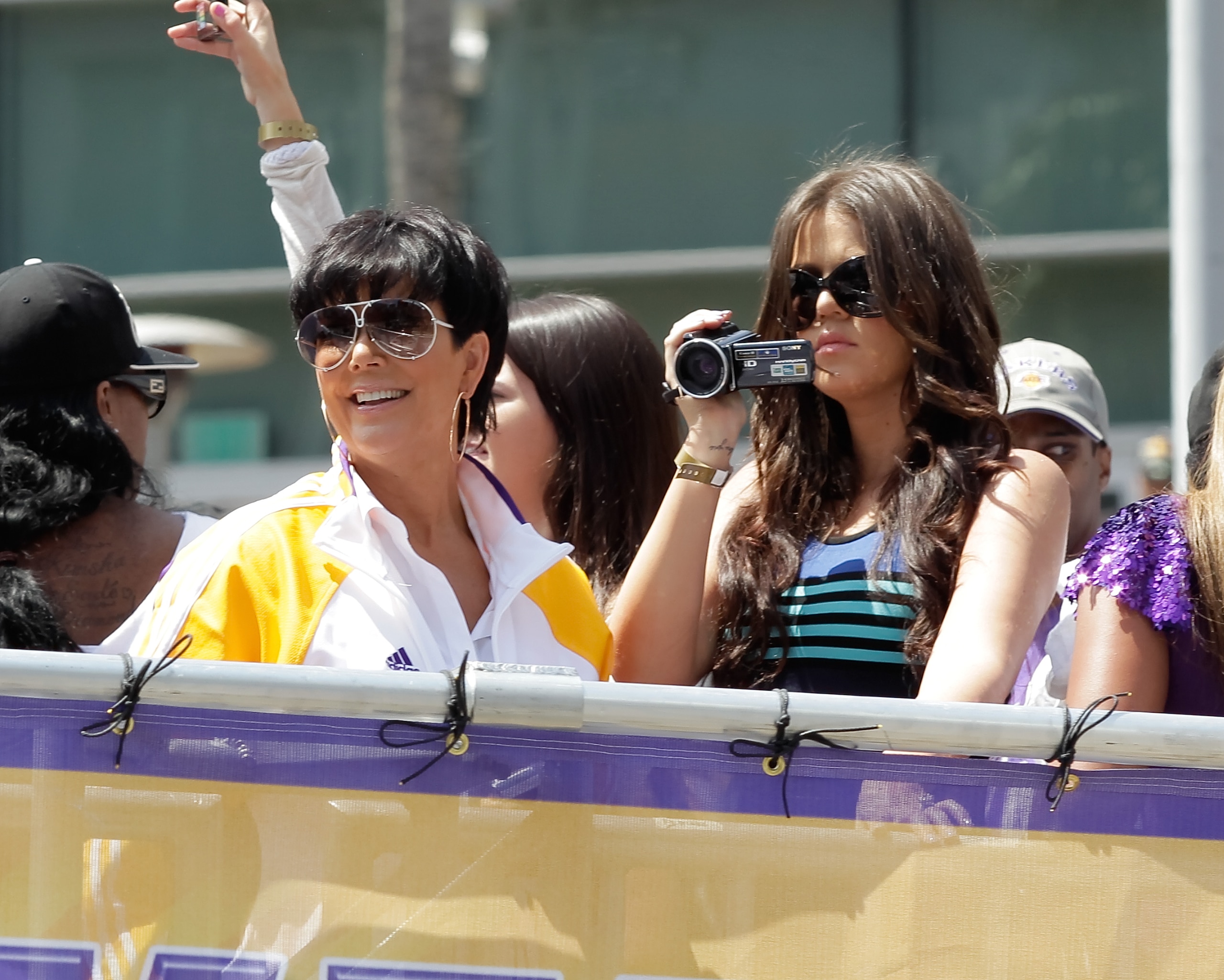 LOS ANGELES, CA - JUNE 21:  (L-R) Kris Jenner and Khloe Kardashian wave to the crowd at the victory parade for the the NBA basketball champion team on June 21, 2010 in Los Angeles, California. The Lakers beat the Boston Celtics 87-79 in 7 games for the fr