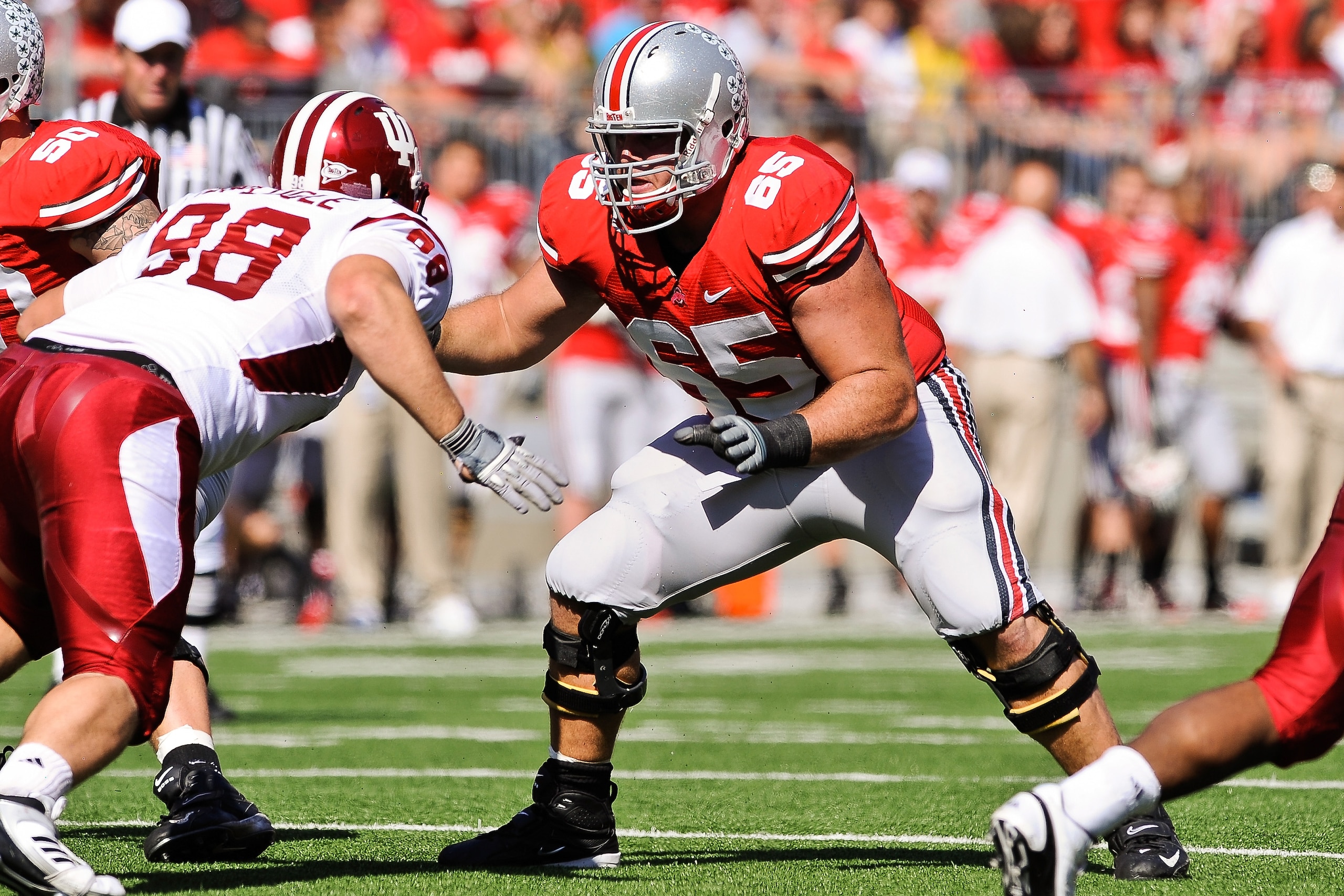 COLUMBUS, OH - OCTOBER 9:  Justin Boren #65 of the Ohio State Buckeyes blocks against the Indiana Hoosiers at Ohio Stadium on October 9, 2010 in Columbus, Ohio.  (Photo by Jamie Sabau/Getty Images)