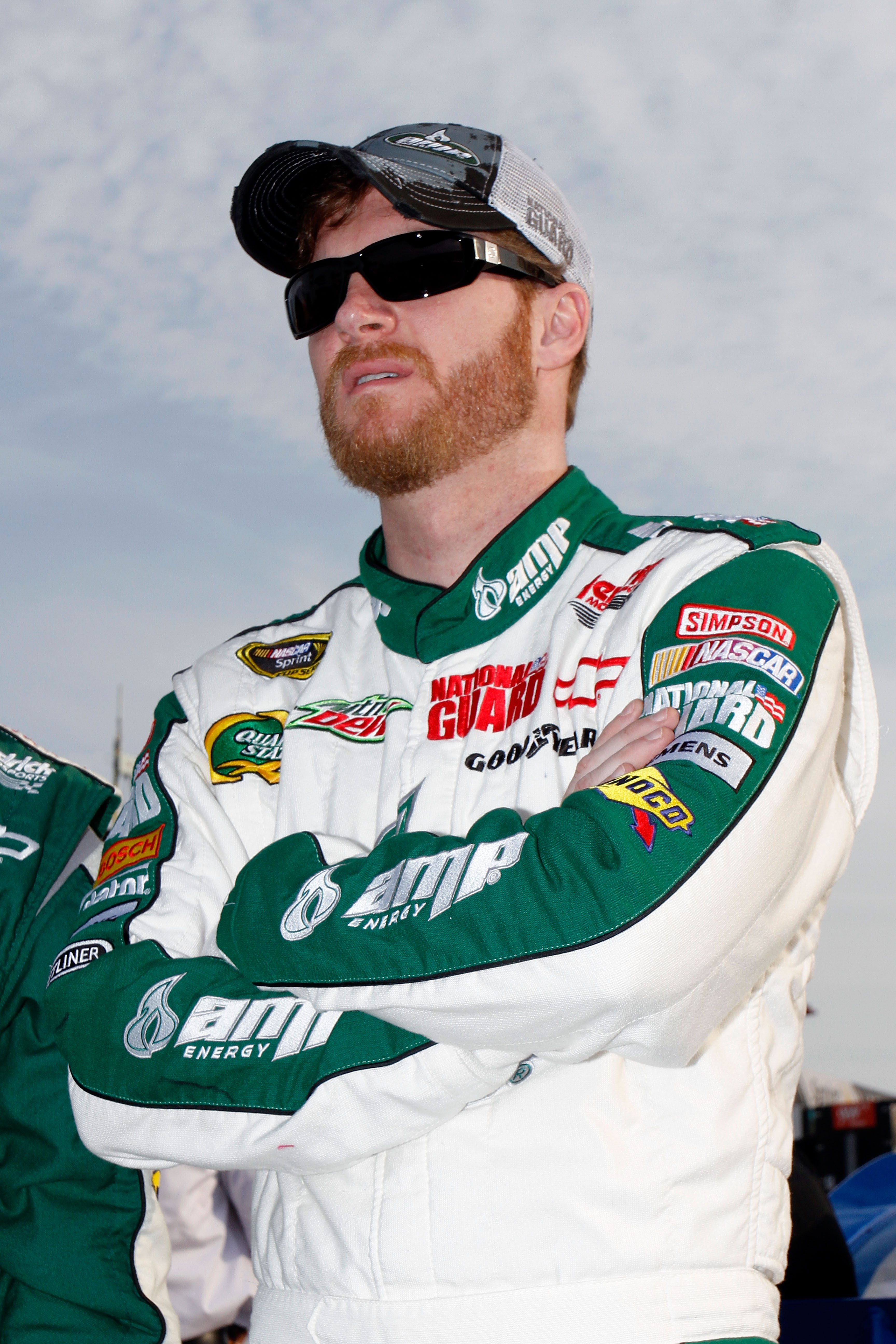 FORT WORTH, TX - APRIL 09:  Dale Earnhardt Jr., driver of the #88 Amp Energy/National Guard Chevrolet, stands on the grid prior to the NASCAR Sprint Cup Series Samsung Mobile 500 at Texas Motor Speedway on April 9, 2011 in Fort Worth, Texas.  (Photo by Ja