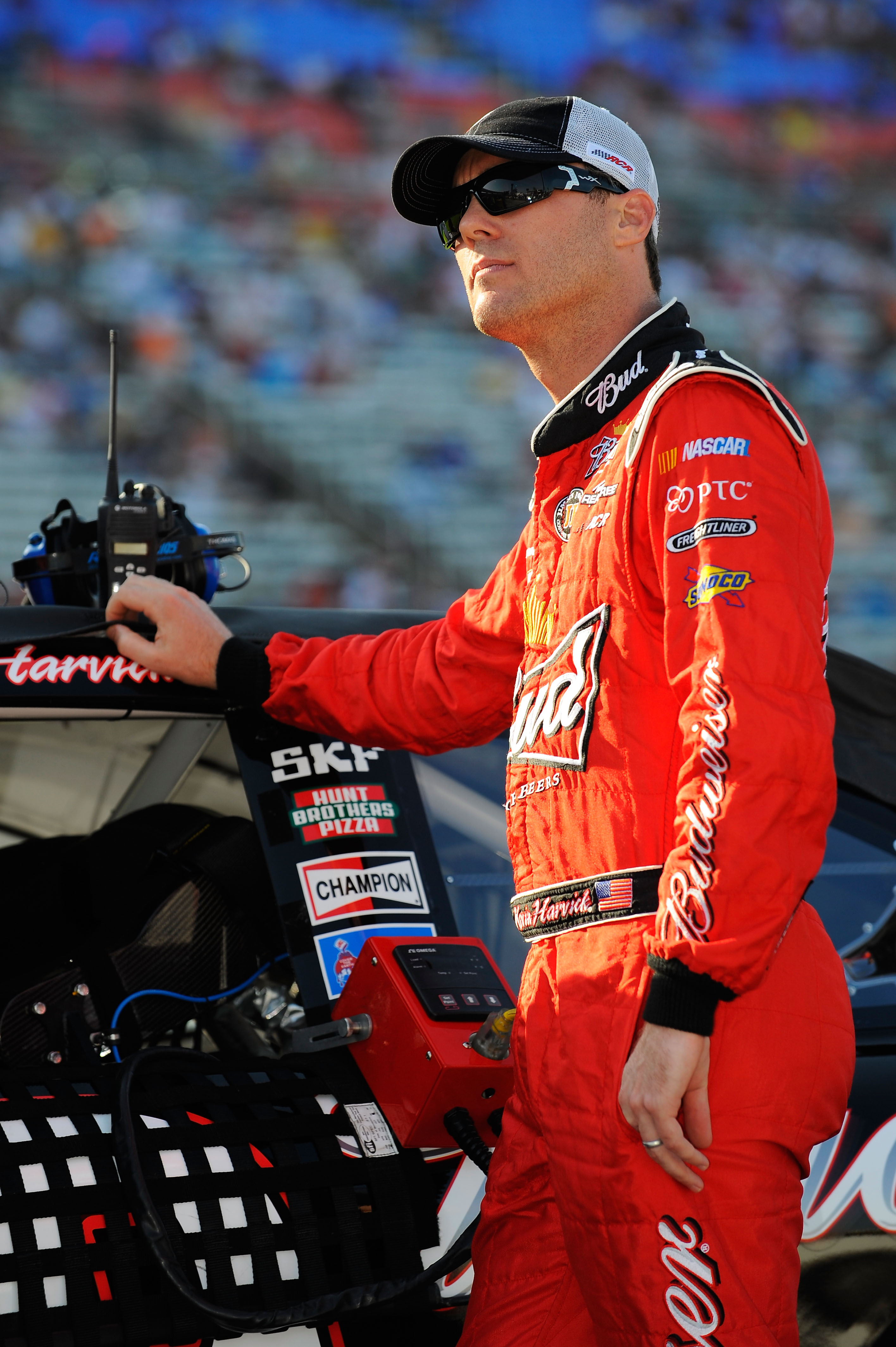 FORT WORTH, TX - APRIL 08:  Kevin Harvick, driver of the #29 Budweiser Chevrolet, stands on the grid during qualifying for the NASCAR Sprint Cup Series Samsung Mobile 500 at Texas Motor Speedway on April 8, 2011 in Fort Worth, Texas.  (Photo by Jared C. T