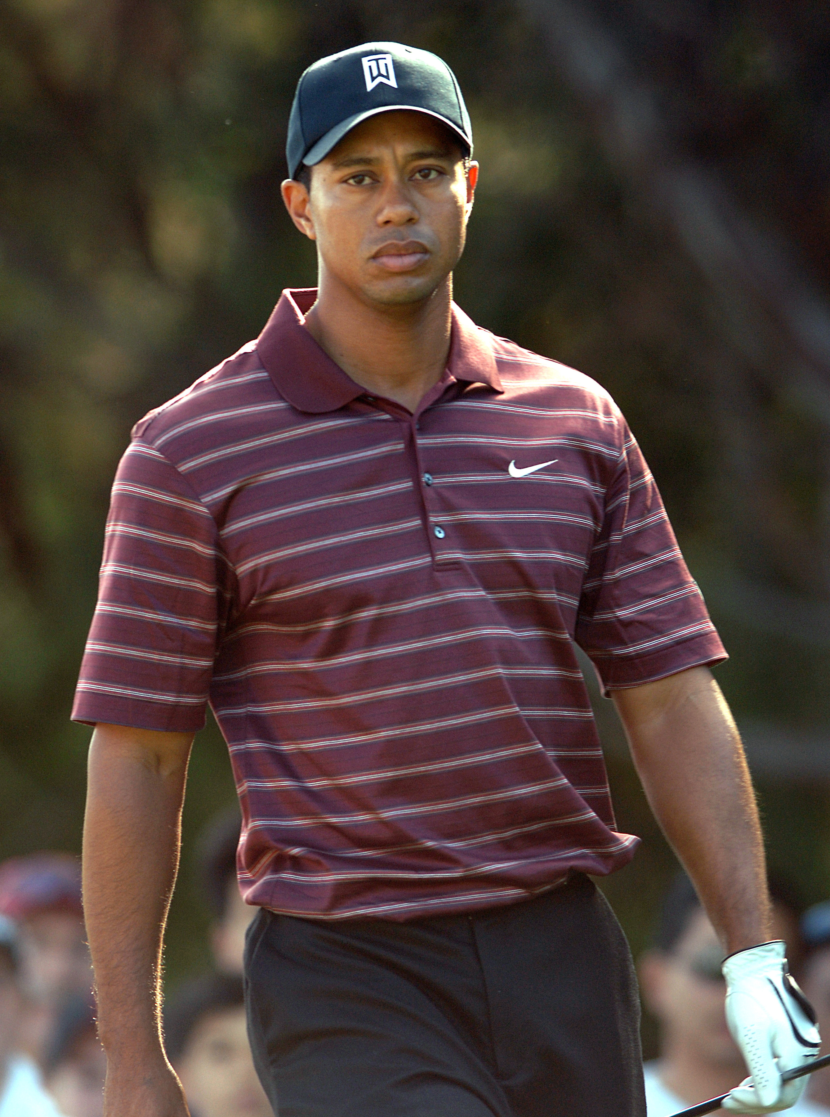 UNITED STATES - DECEMBER 11:  Tiger Woods walks from the seventh fairway during the final round of the 2005 Target World Challenge Presented by Countrywide at the Sherwood Country Club in Thousand Oaks, California December 11, 2005.  (Photo by Steve Grays