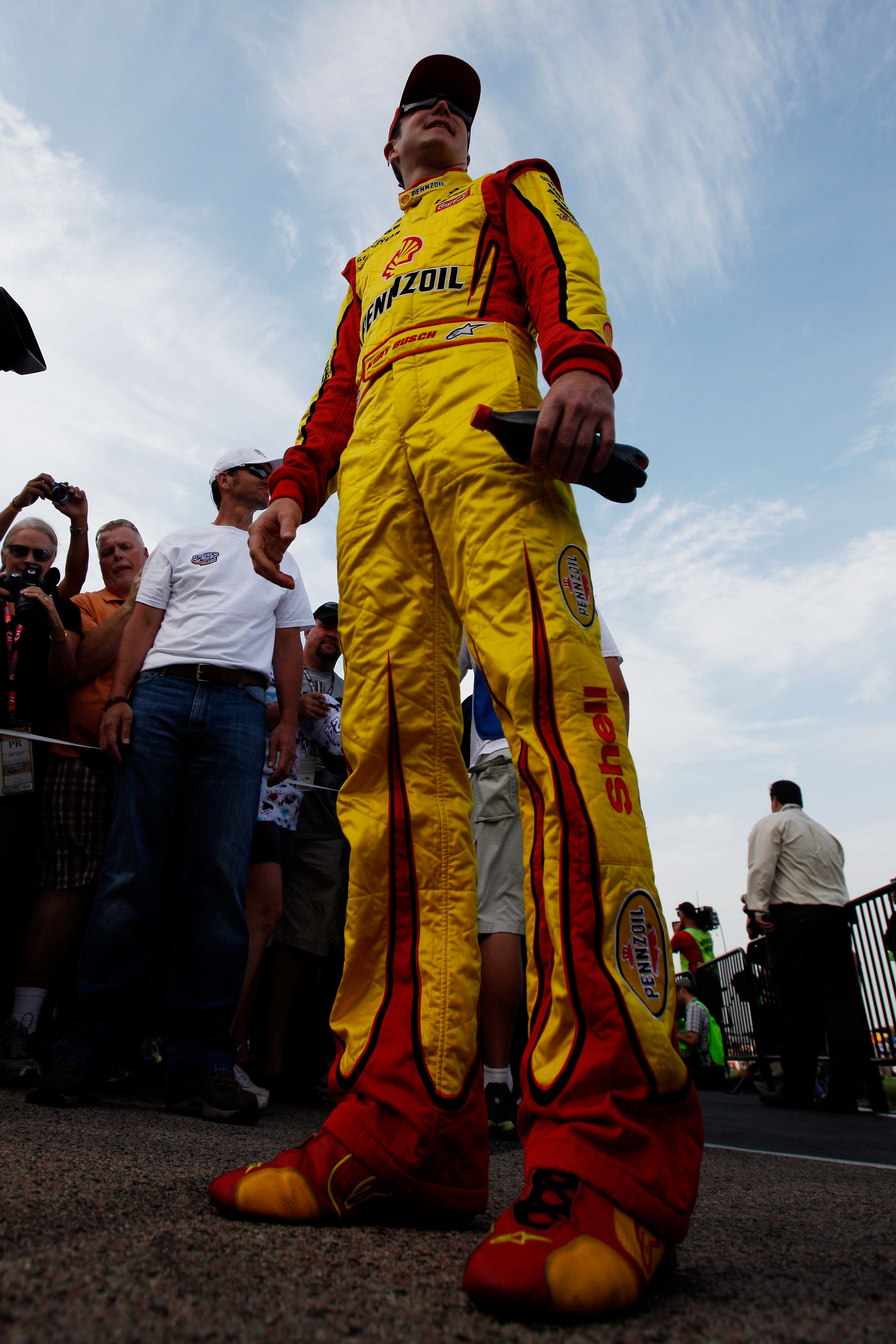 FORT WORTH, TX - APRIL 09:  Kurt Busch, driver of the #22 Shell/Pennzoil Dodge, stands on the track prior to the NASCAR Sprint Cup Series Samsung Mobile 500 at Texas Motor Speedway on April 9, 2011 in Fort Worth, Texas.  (Photo by Chris Graythen/Getty Ima