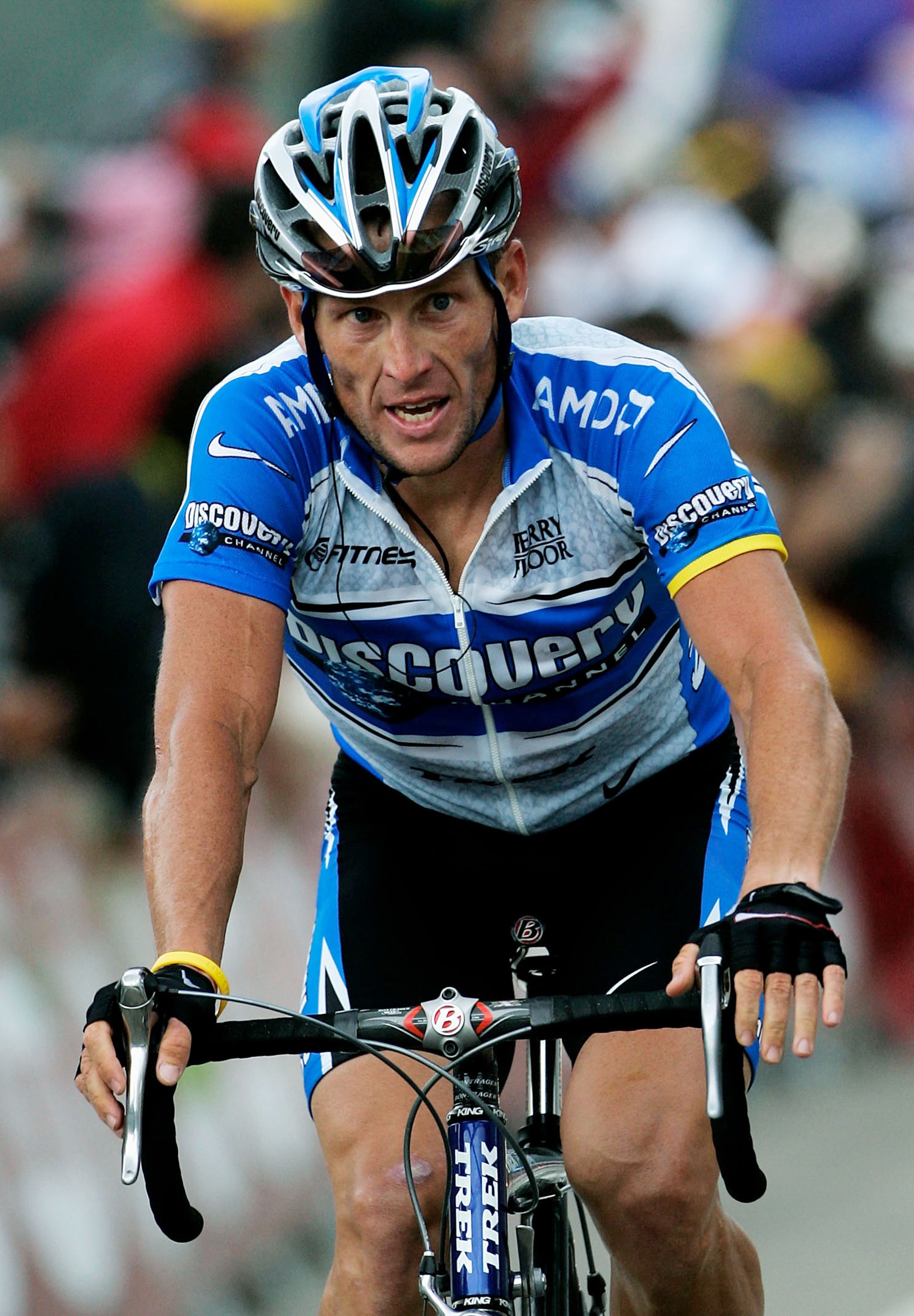 COURCHEVEL, FRANCE - JULY 12:  Lance Armstrong of the U.S. and The Discovery Channel Team crosses the finish line to regain the yellow jersey during Stage 10 of the 92nd Tour de France between Grenoble and Courchevel July 12, 2005 in Courchevel, France.