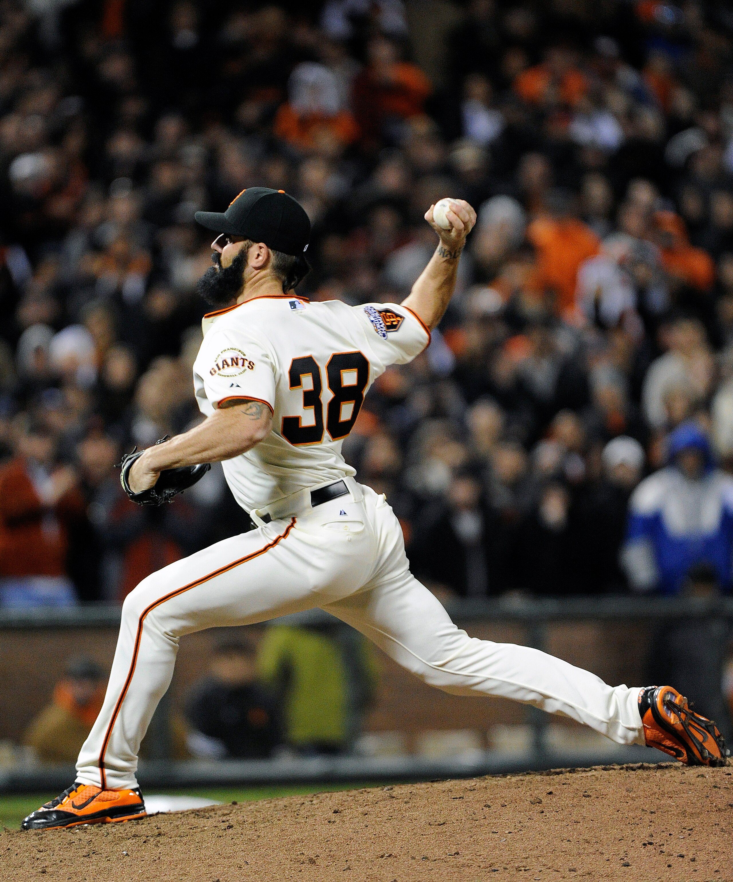 SAN FRANCISCO, CA - APRIL 13: Brian Wilson #38 of the San Francisco Giants pitches in the ninth inning against the Los Angeles Dodgers during a MLB baseball game at AT&T Park April 13, 2011 in San Francisco, California. The Giants won the game 4-3.  (Phot