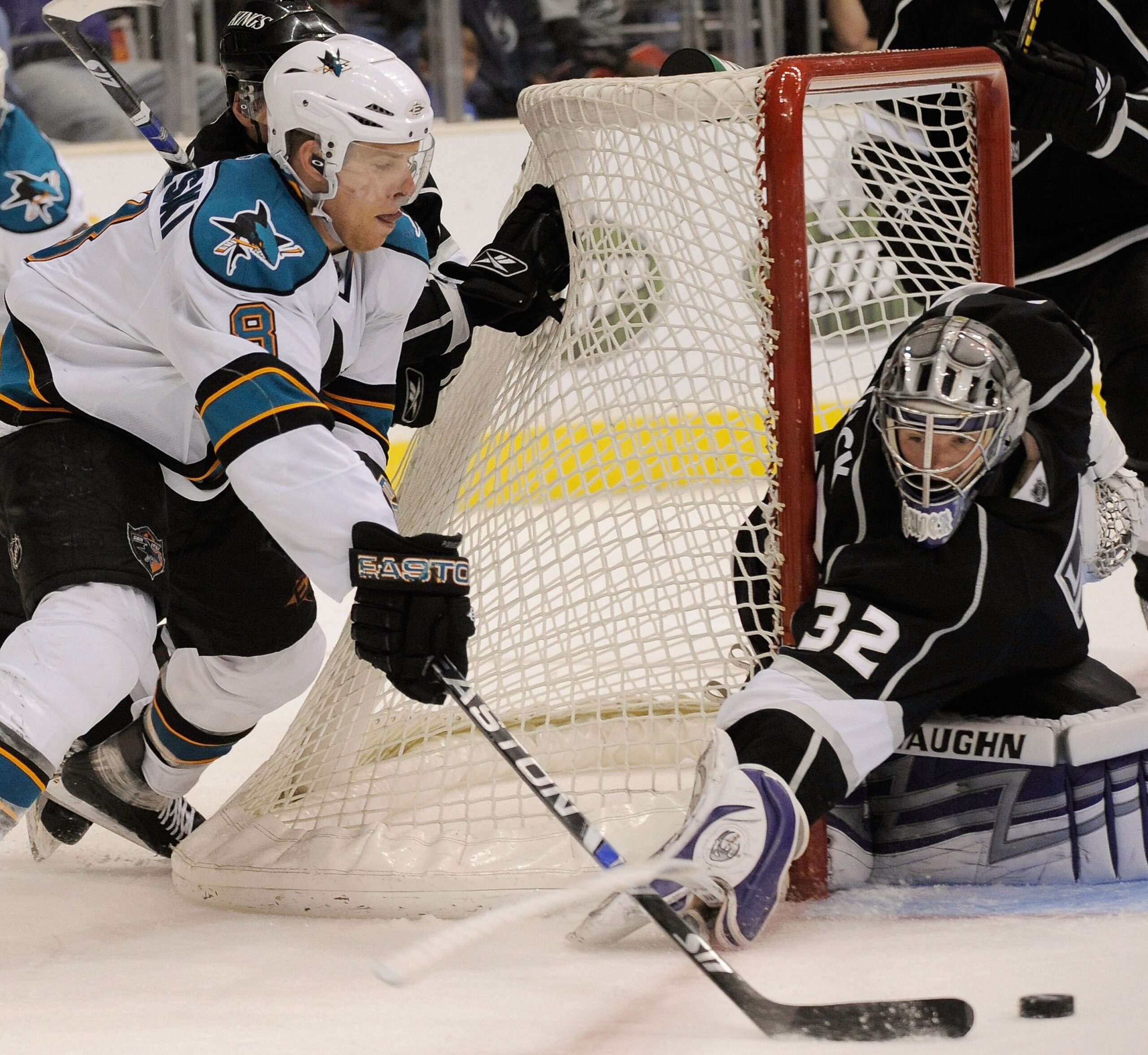 LOS ANGELES, CA - APRIL 11: Goalkeeper Jonathan Quick #32 of the Los Angeles Kings makes a stick check against Joe Pavelski #8 of the San Jose Sharks during the third period of the hockey game on April 11, 2009 at the Staples Center in Los Angeles, Calif LOS ANGELES, CA - APRIL 11: Goalkeeper Jonathan Quick #32 of the Los Angeles Kings makes a stick check against Joe Pavelski #8 of the San Jose Sharks during the third period of the hockey game on April 11, 2009 at the Staples Center in Los Angeles, Calif